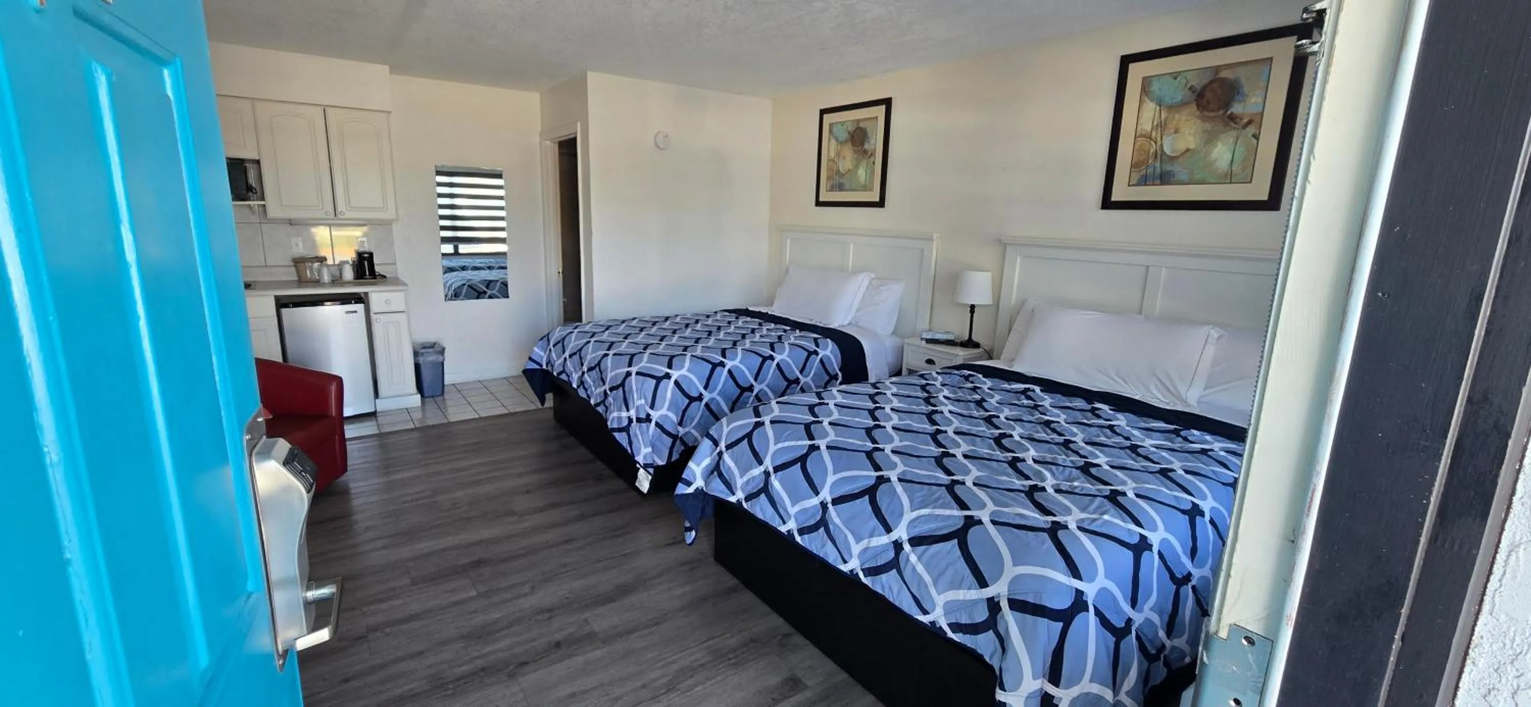 Bed in Merida Inn & Suites