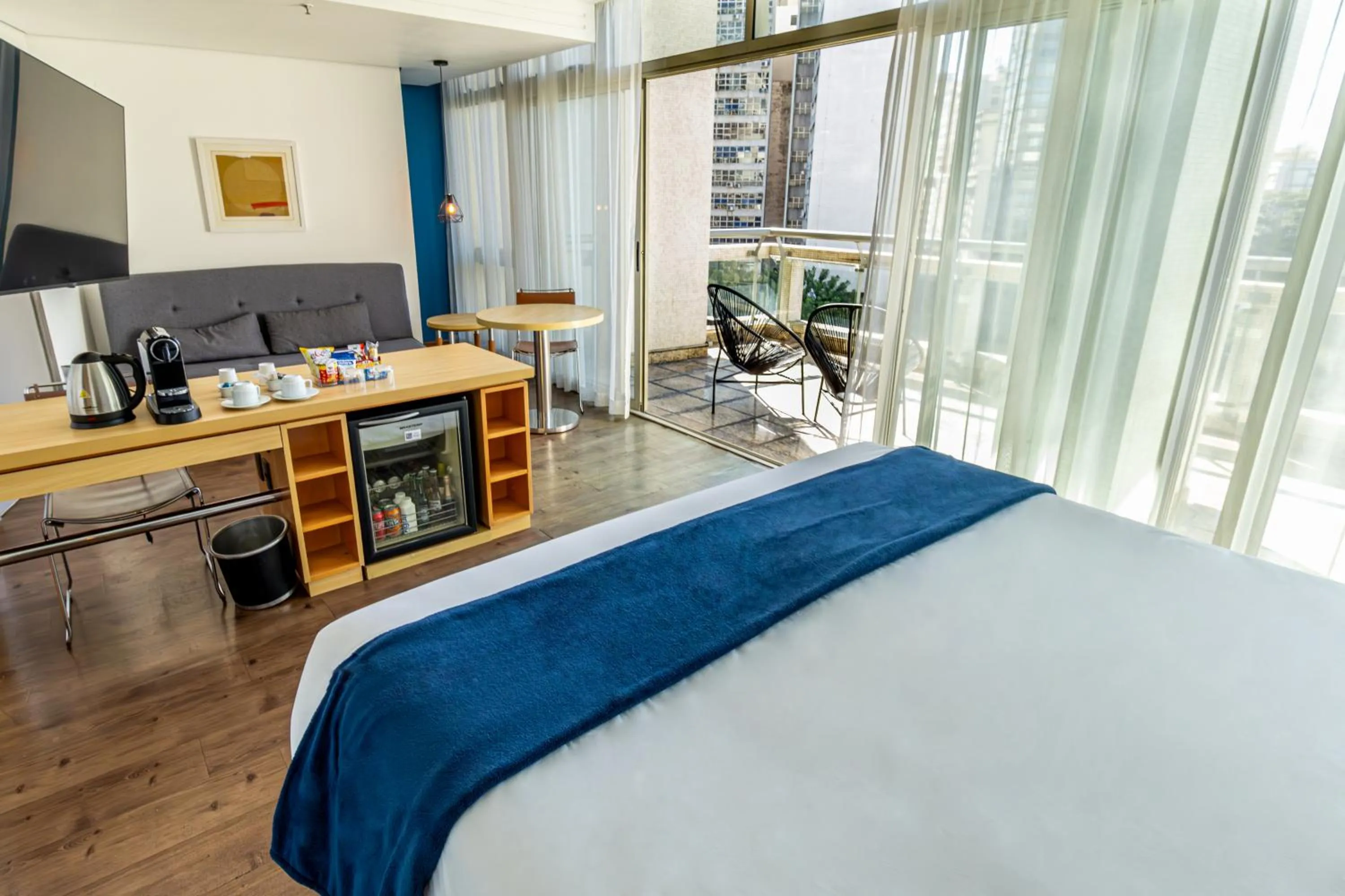 Communal lounge/ TV room, Bed in Hotel Nacional Inn Jaragua Sao Paulo