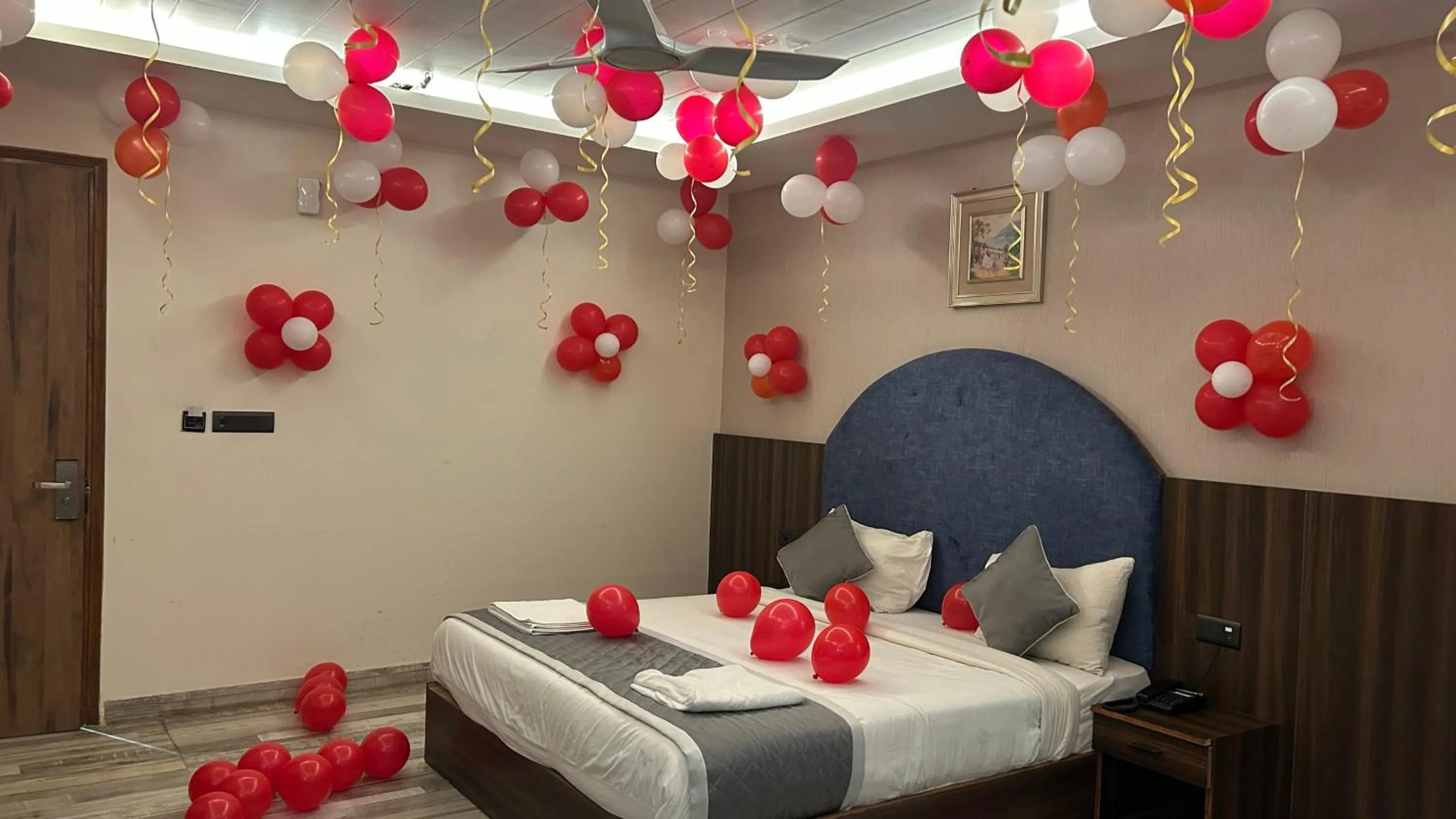 Photo of the whole room, Bed in Raksha Suites & Banquet Greater Noida