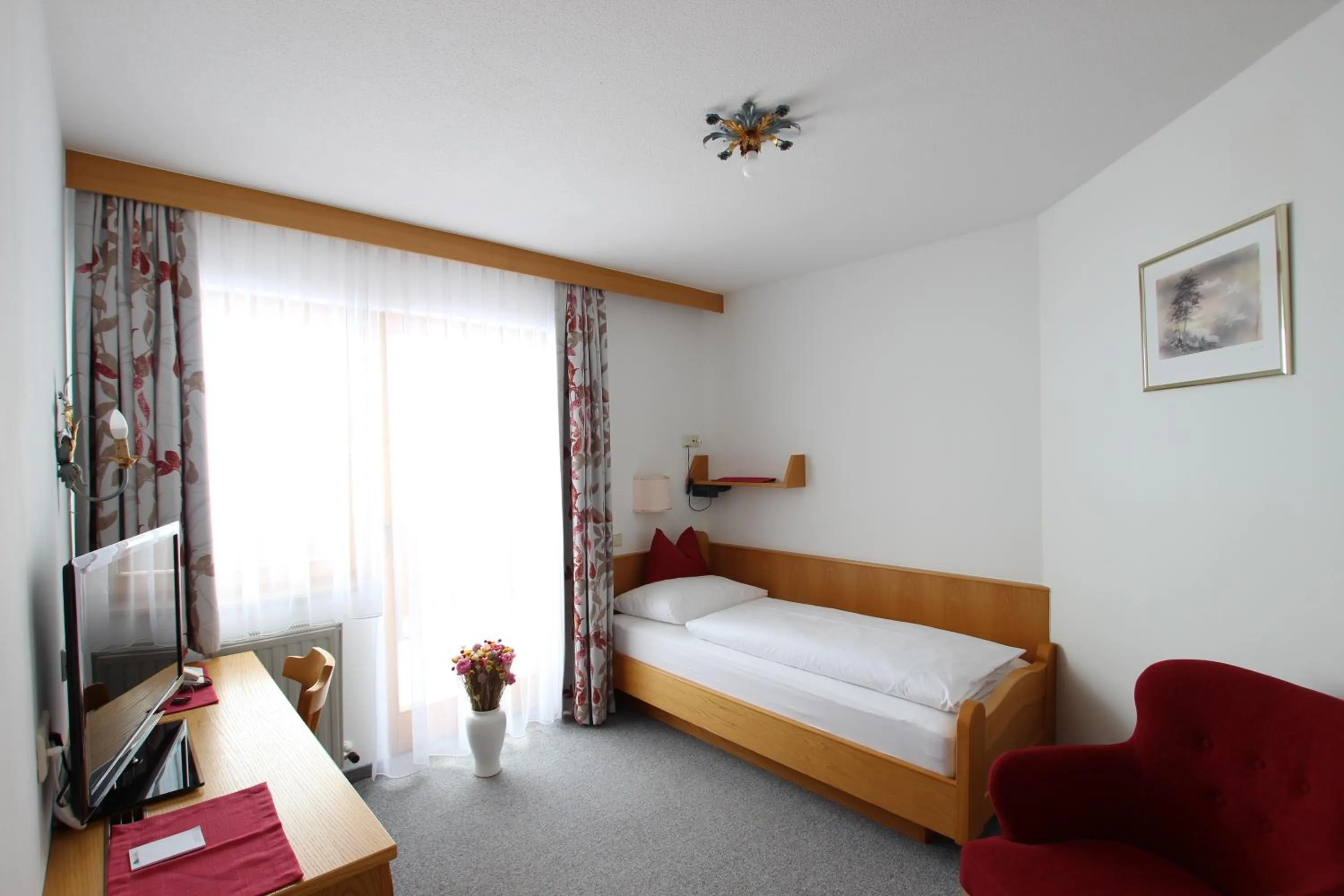 Photo of the whole room, Bed in Hotel Garni Bel-Ami