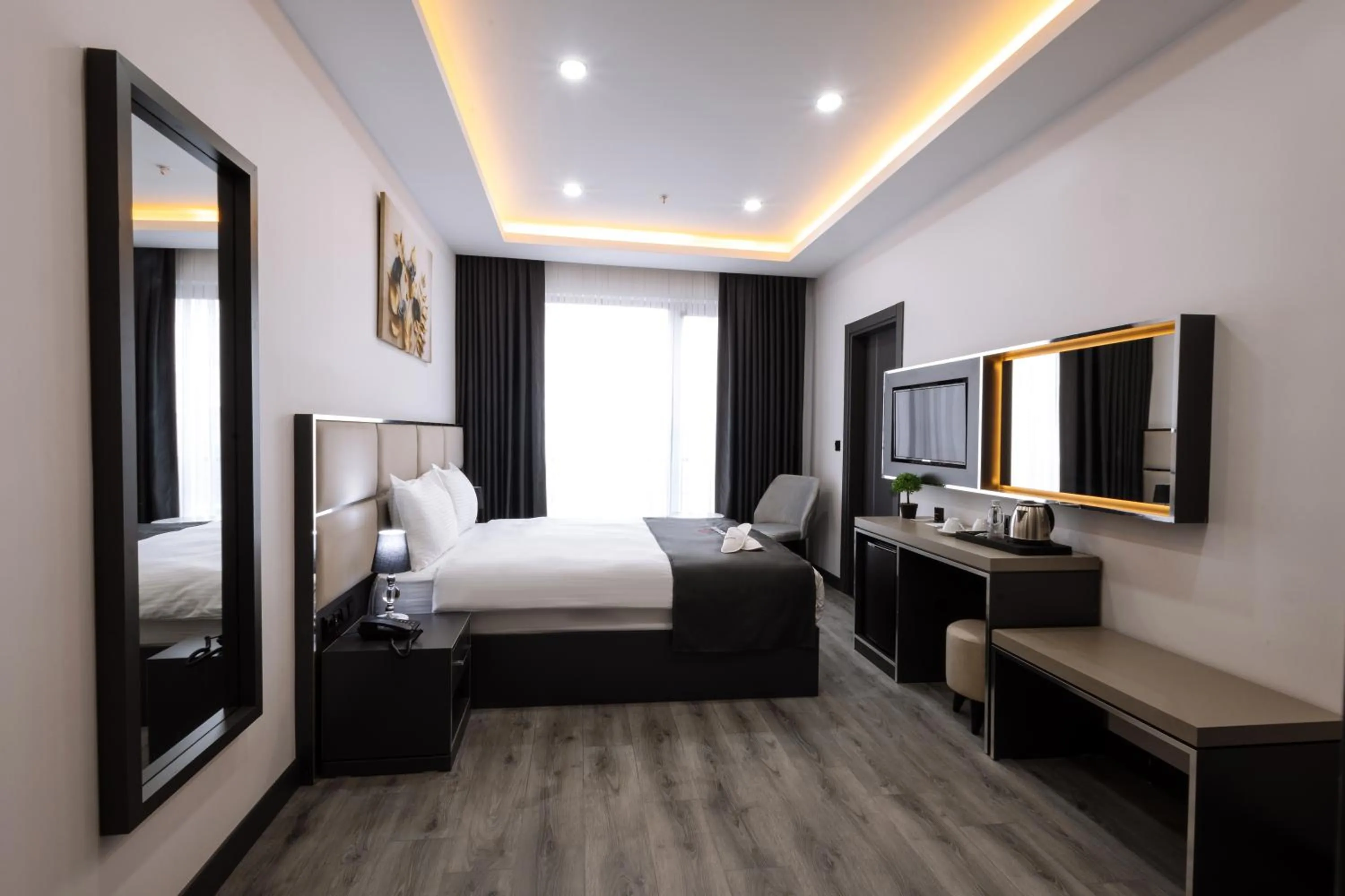 TV and multimedia, Bed in Meyzi Hotel