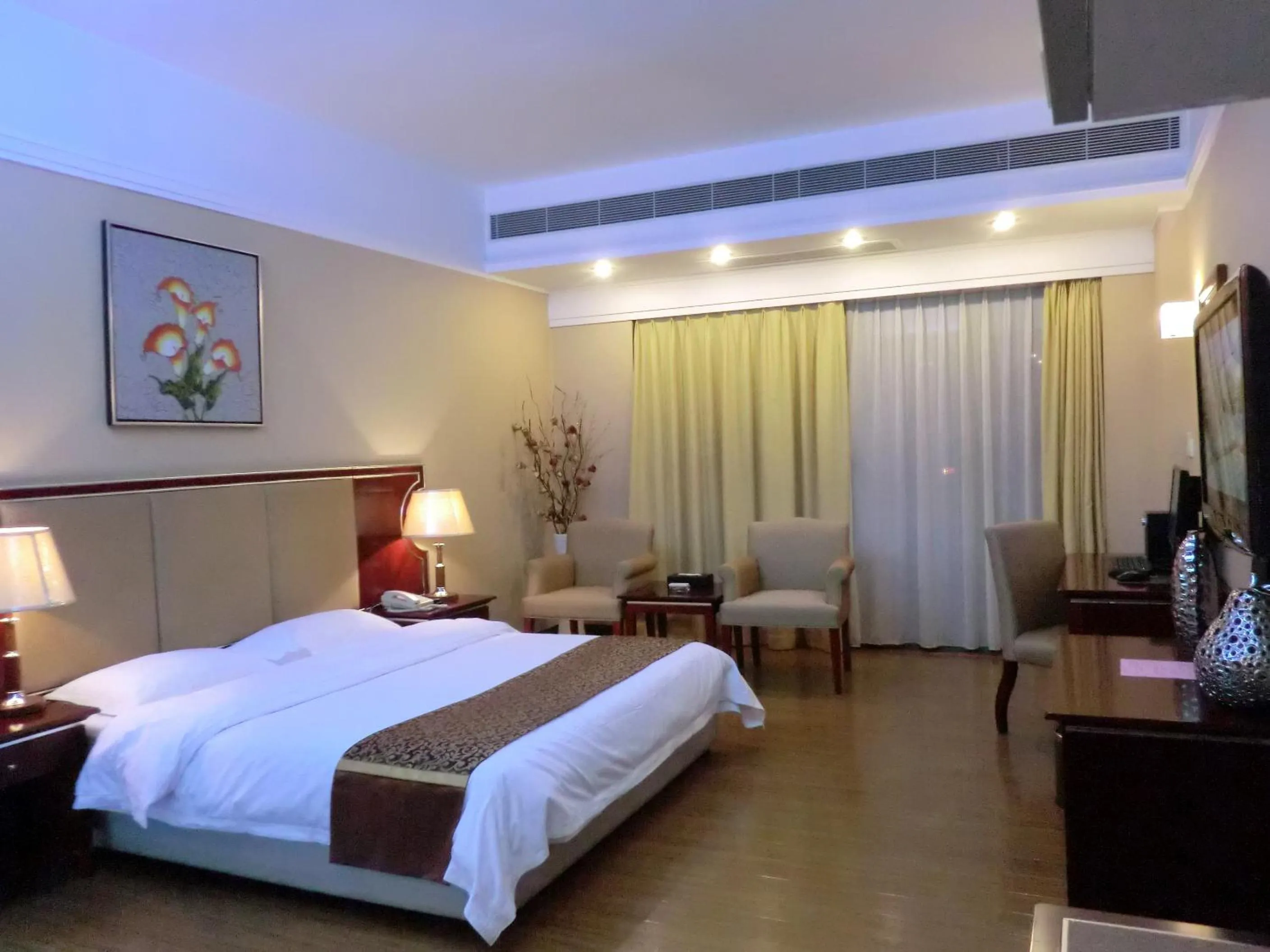 Bedroom in 悦丰酒店广州银丰国际公寓北站店