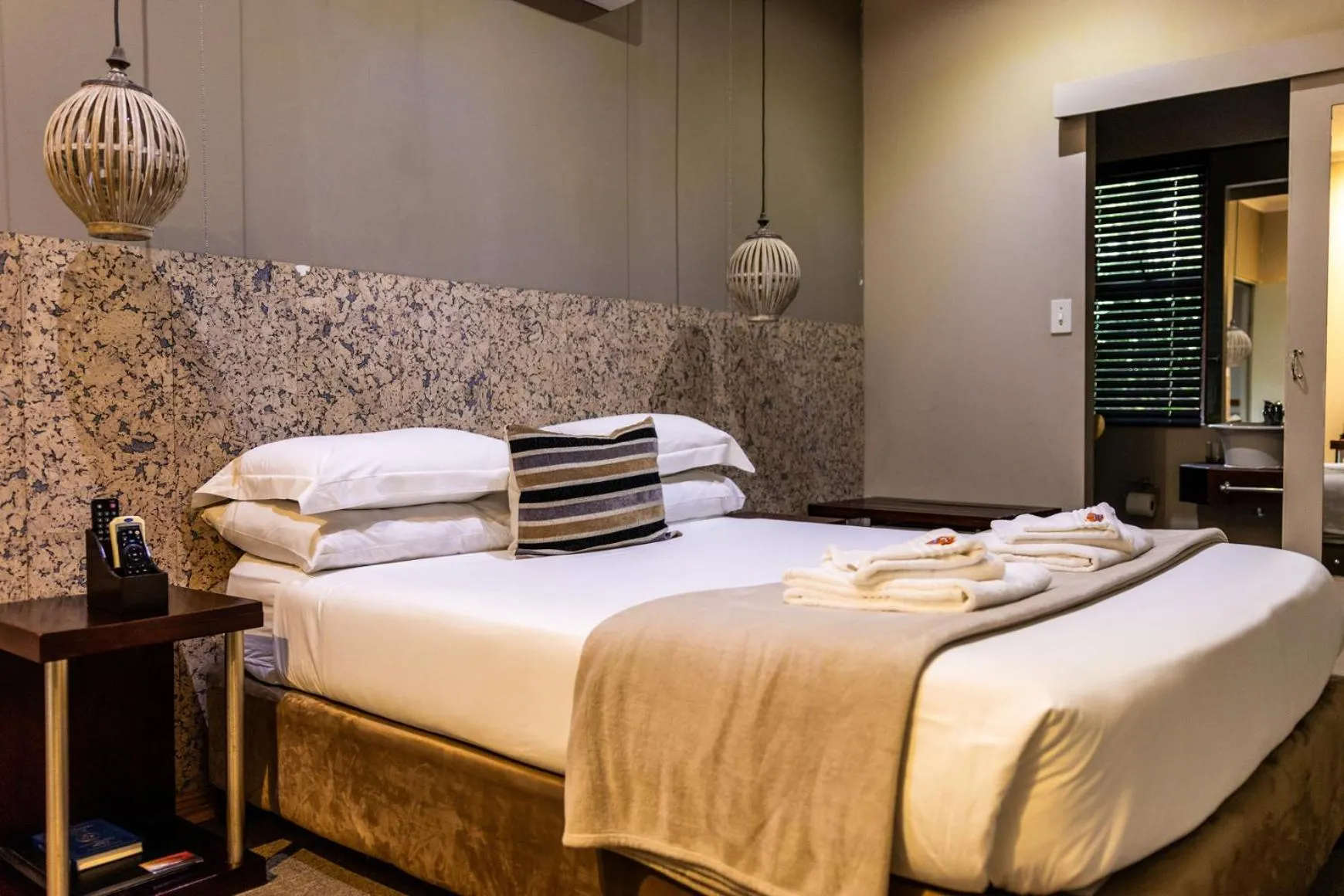 Bedroom, Bed in Elegant Lodge & Conference Center