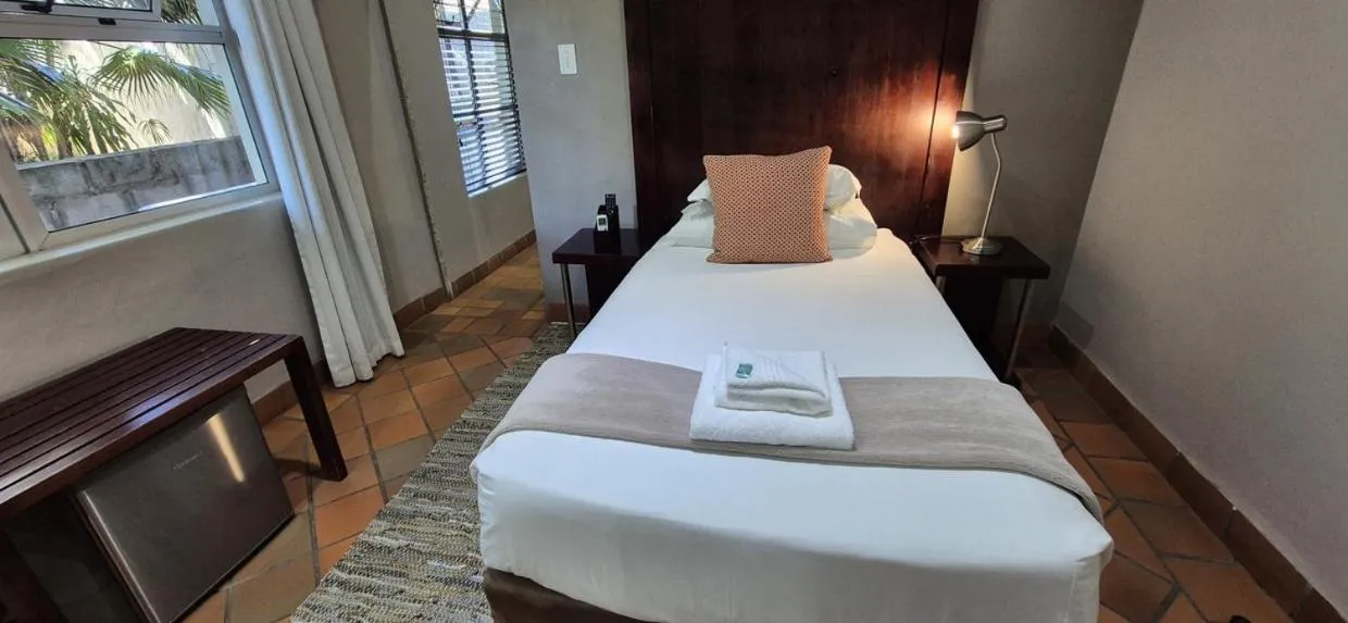 Bedroom, Bed in Elegant Lodge & Conference Center