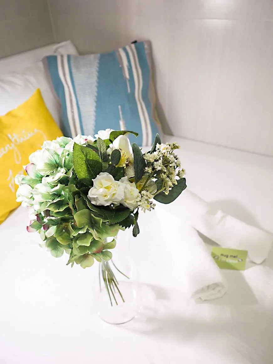 Bed in Joyous Guest House