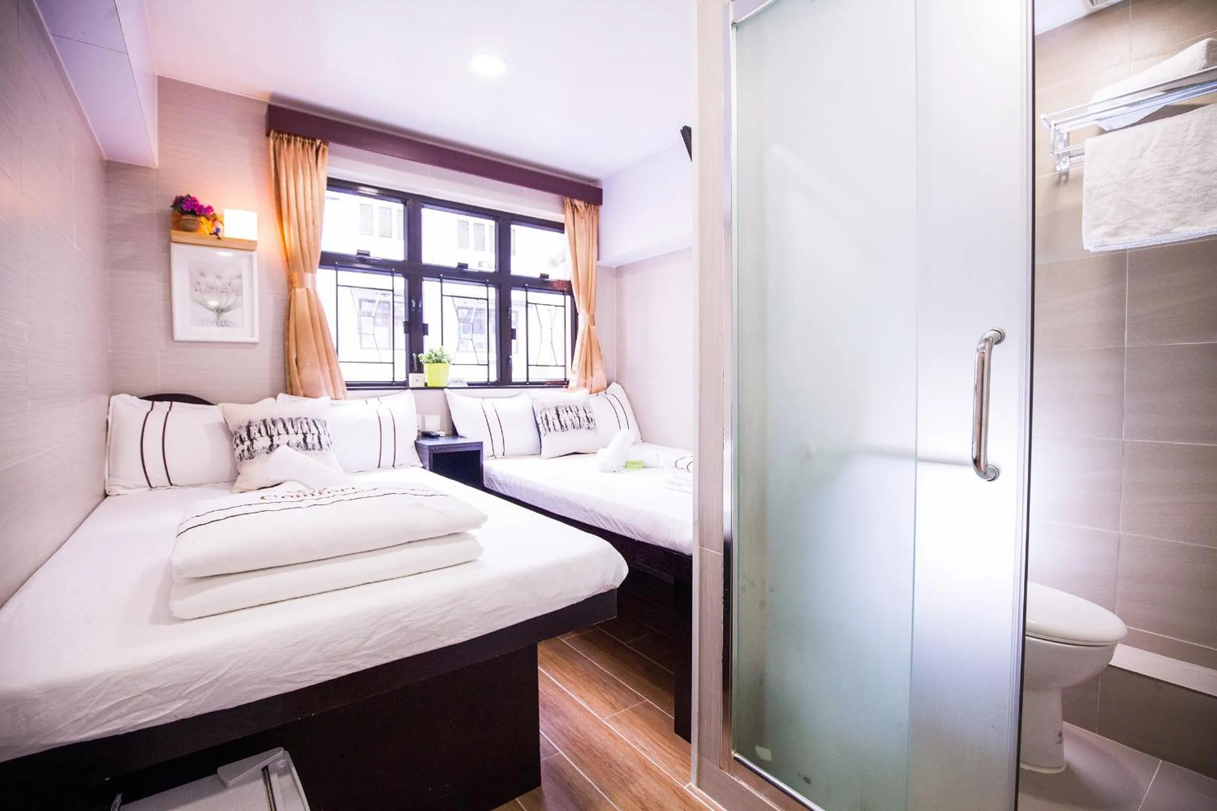 Bed in Joyous Guest House