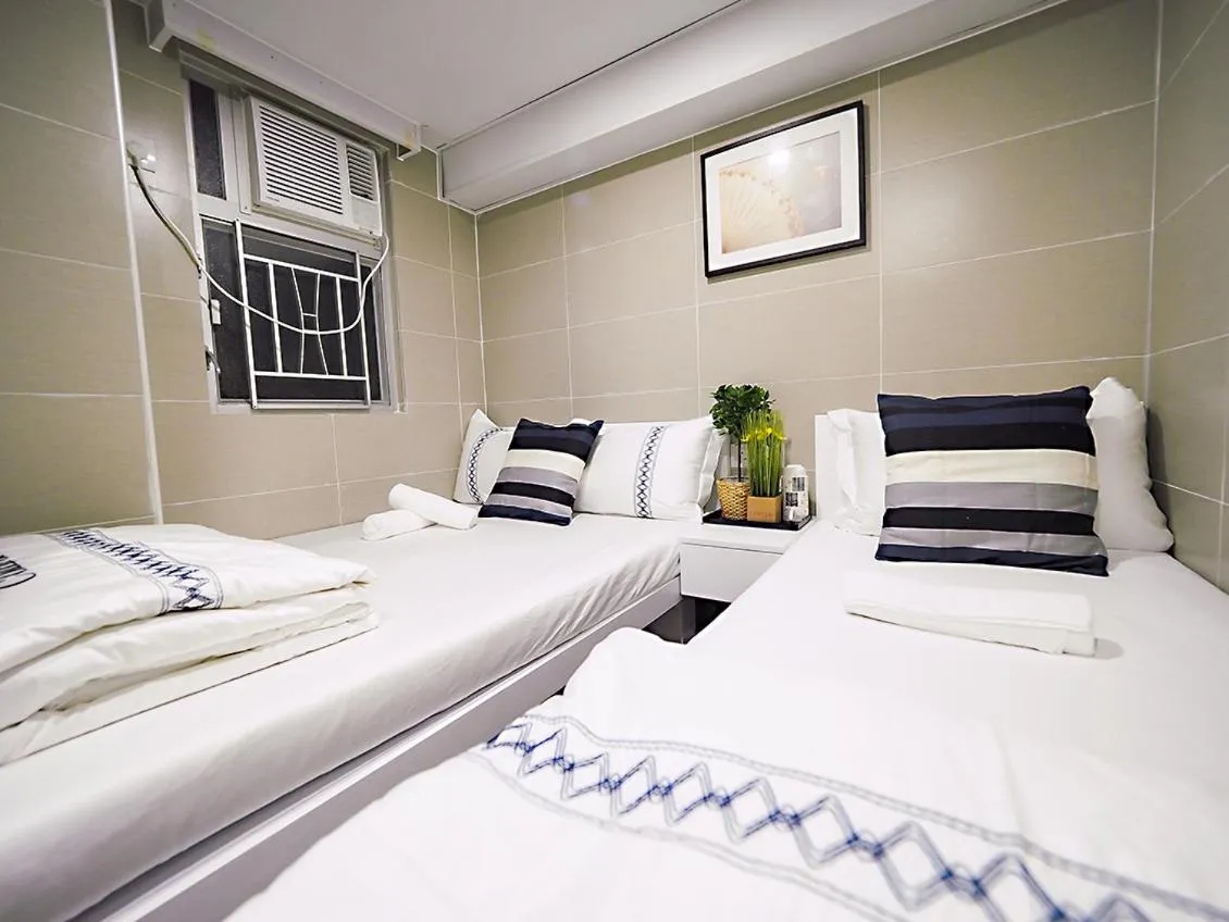 Bed in Joyous Guest House