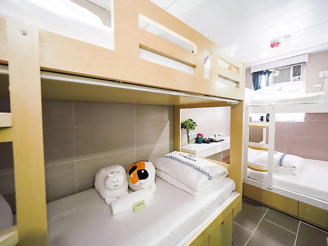 Bed in Joyous Guest House