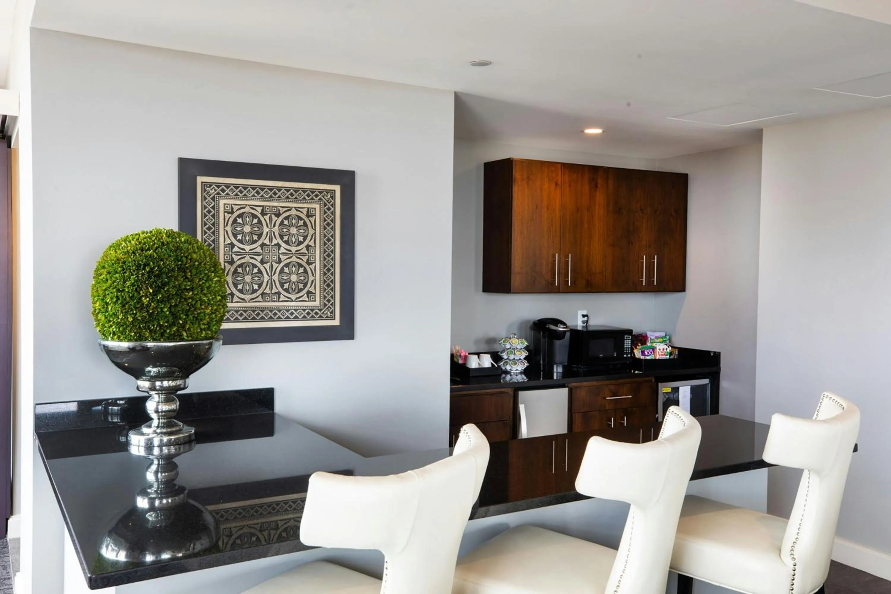 Kitchen or kitchenette in Ambassador Hotel Wichita, Autograph Collection