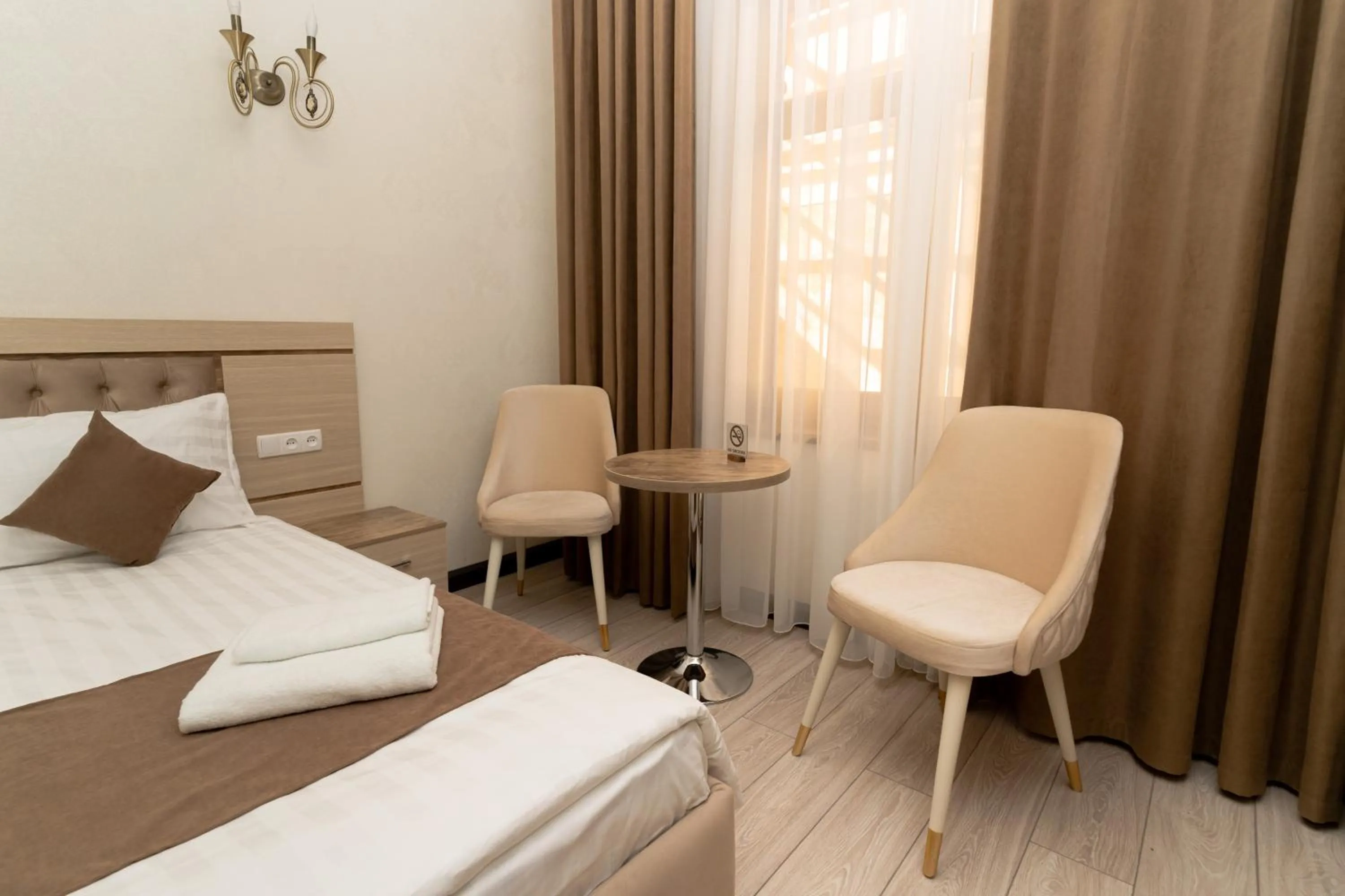 Photo of the whole room, Bed in The Heritage Tashkent