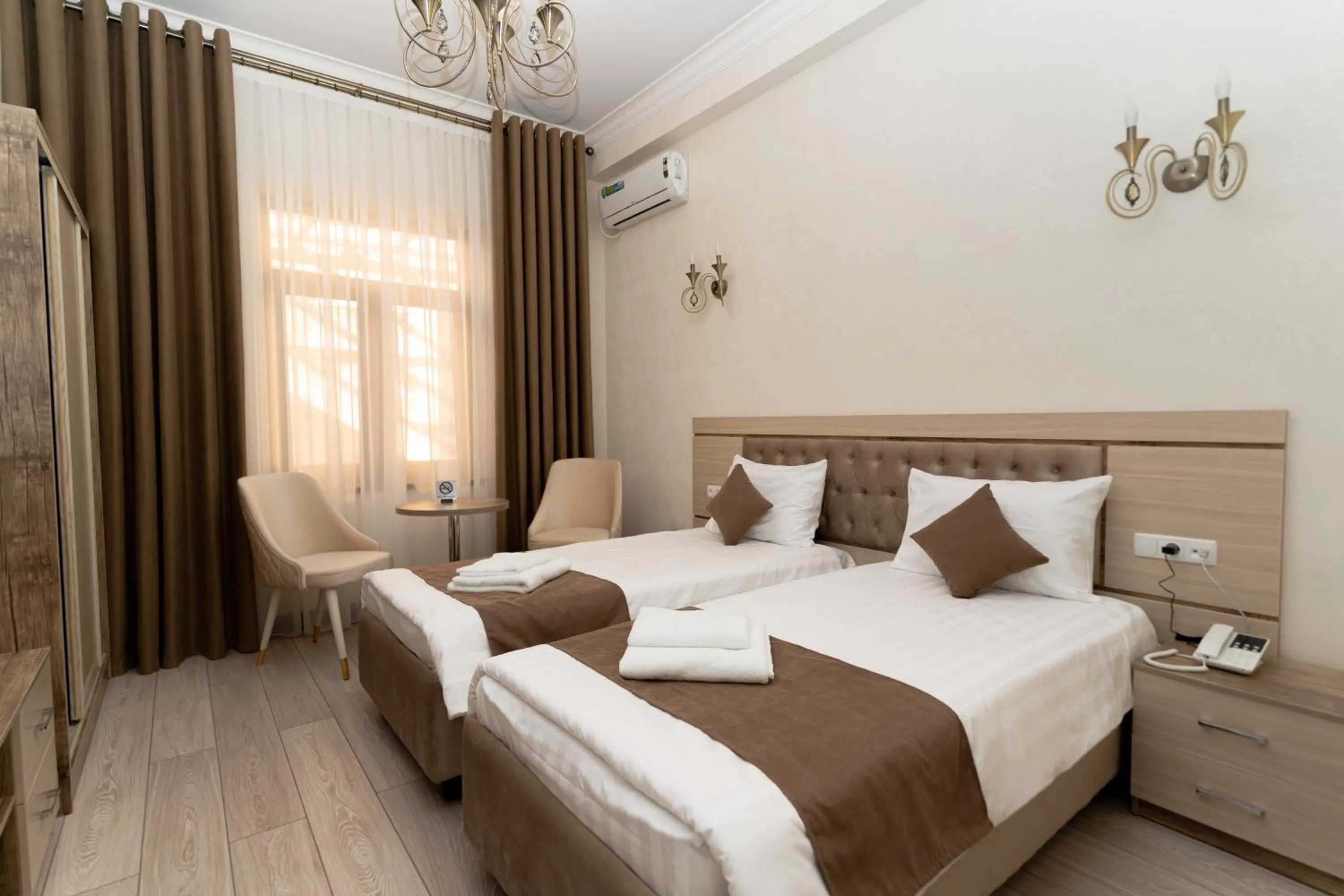 Photo of the whole room, Bed in The Heritage Tashkent