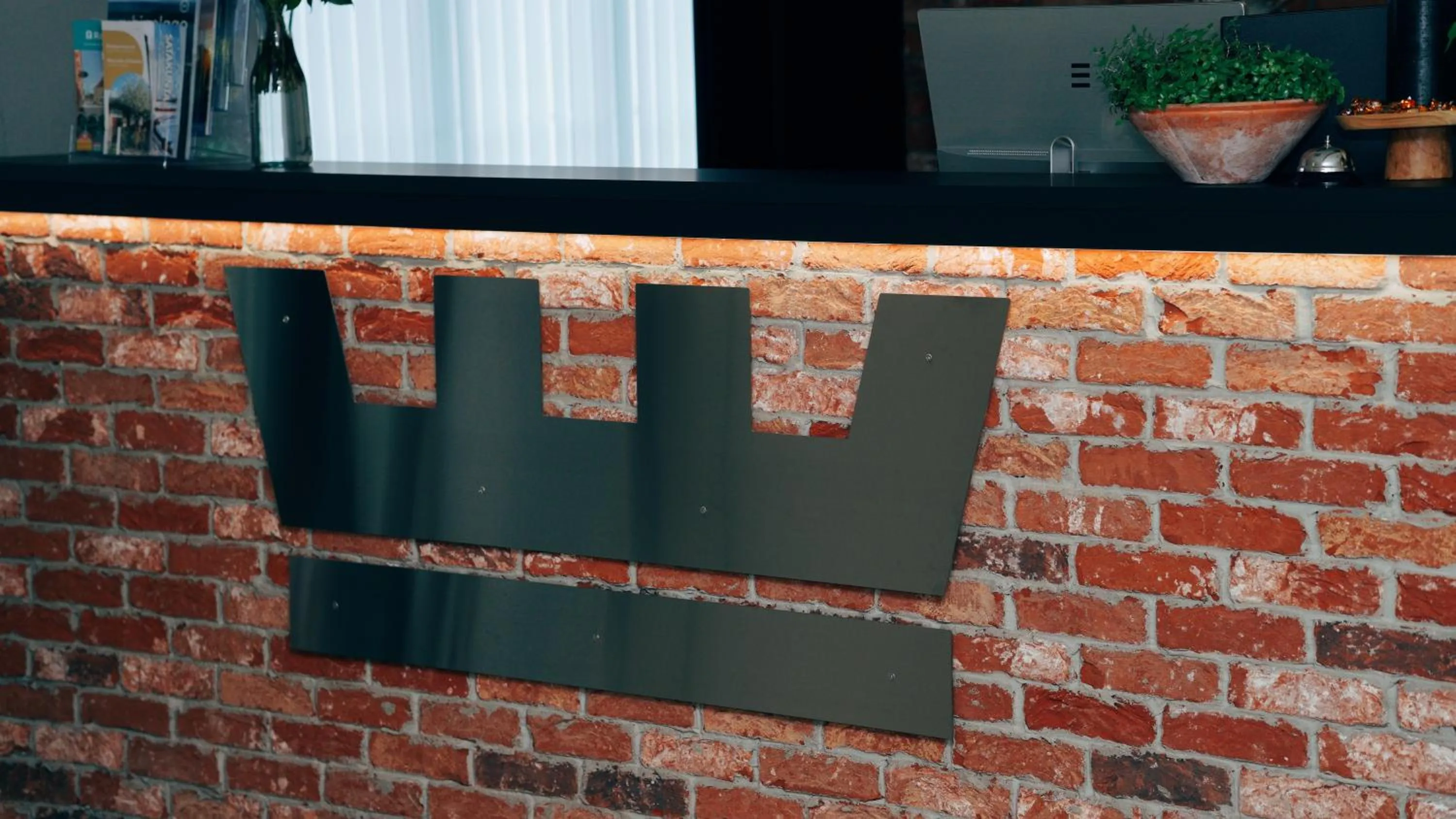 Property logo or sign in Loft Hotel Rauma