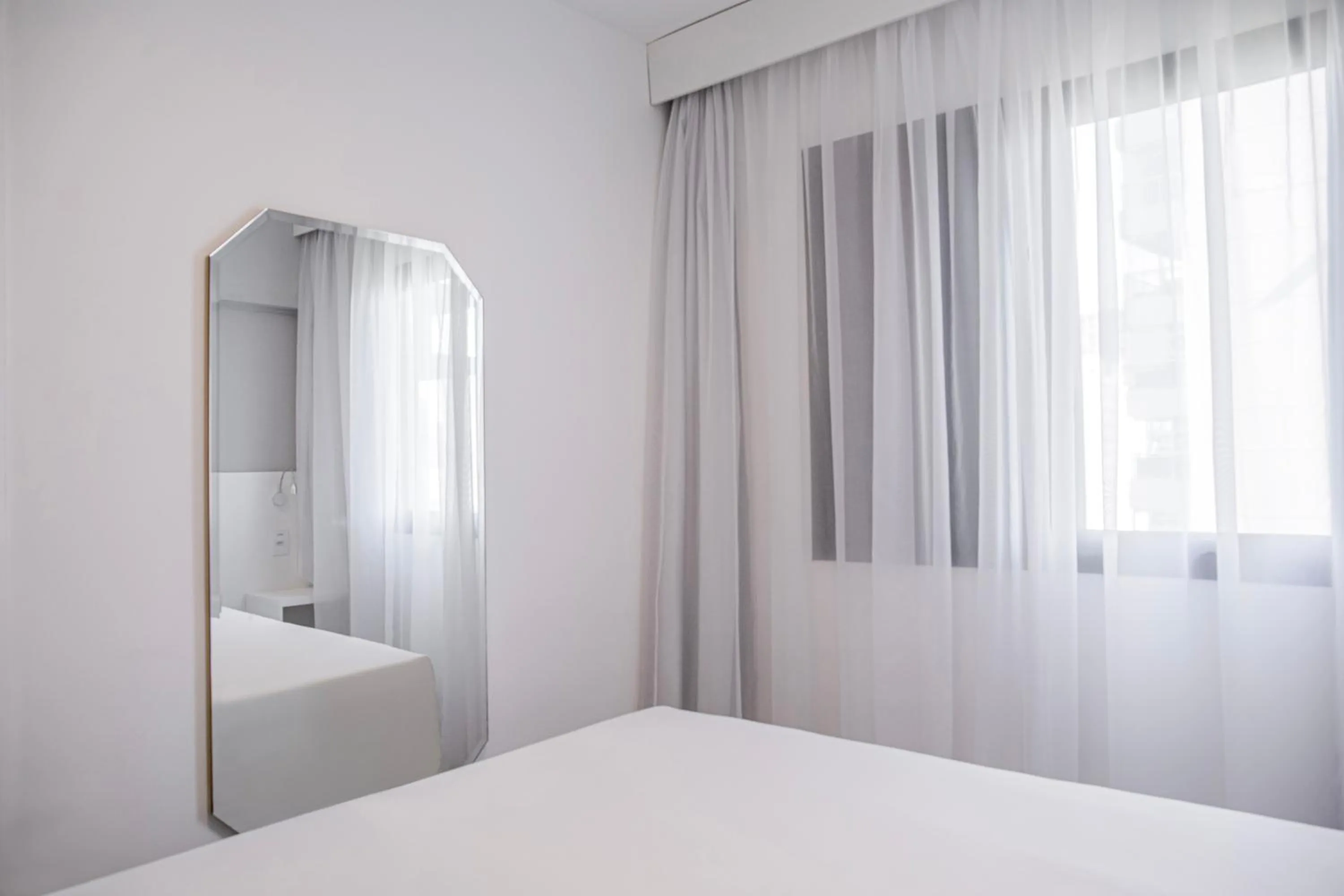 Bed in Mercure Sao Paulo Berrini