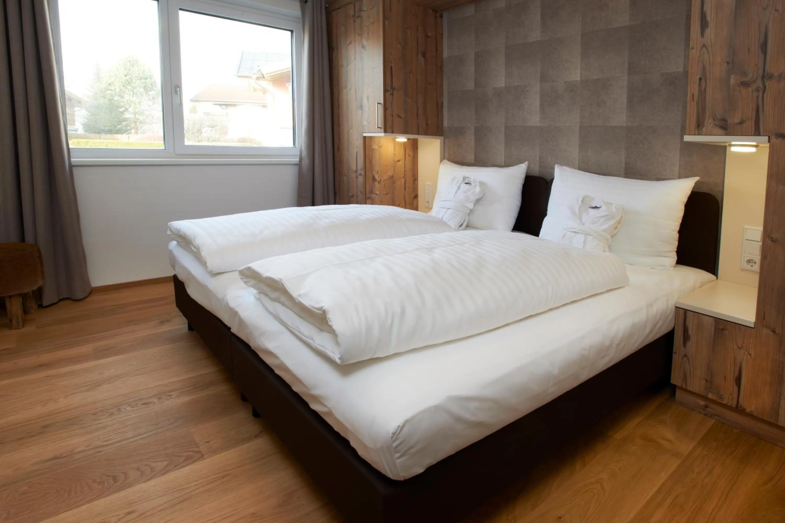 Bed in Ski & Golf Suites Zell am See by Alpin Rentals
