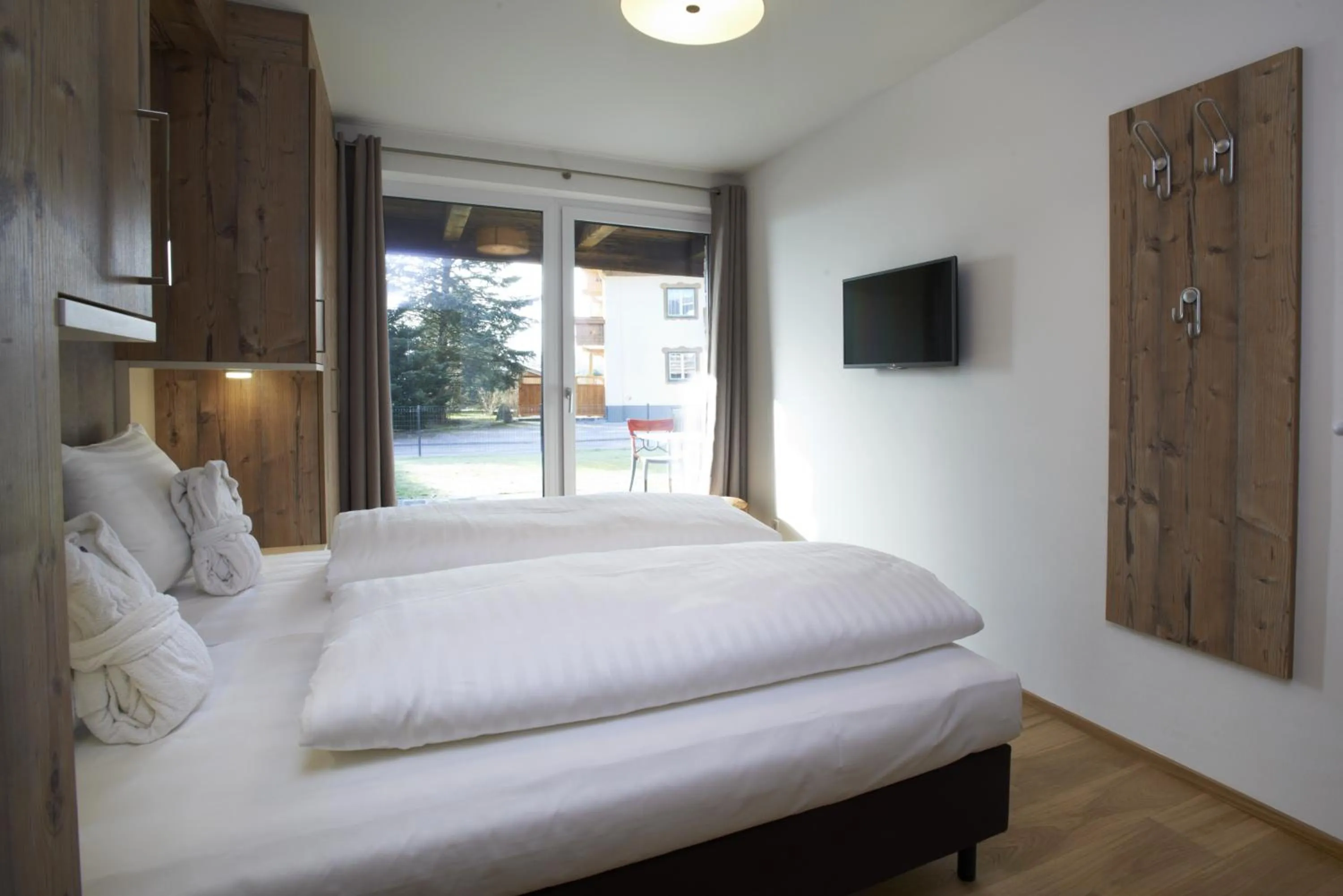 Bed in Ski & Golf Suites Zell am See by Alpin Rentals