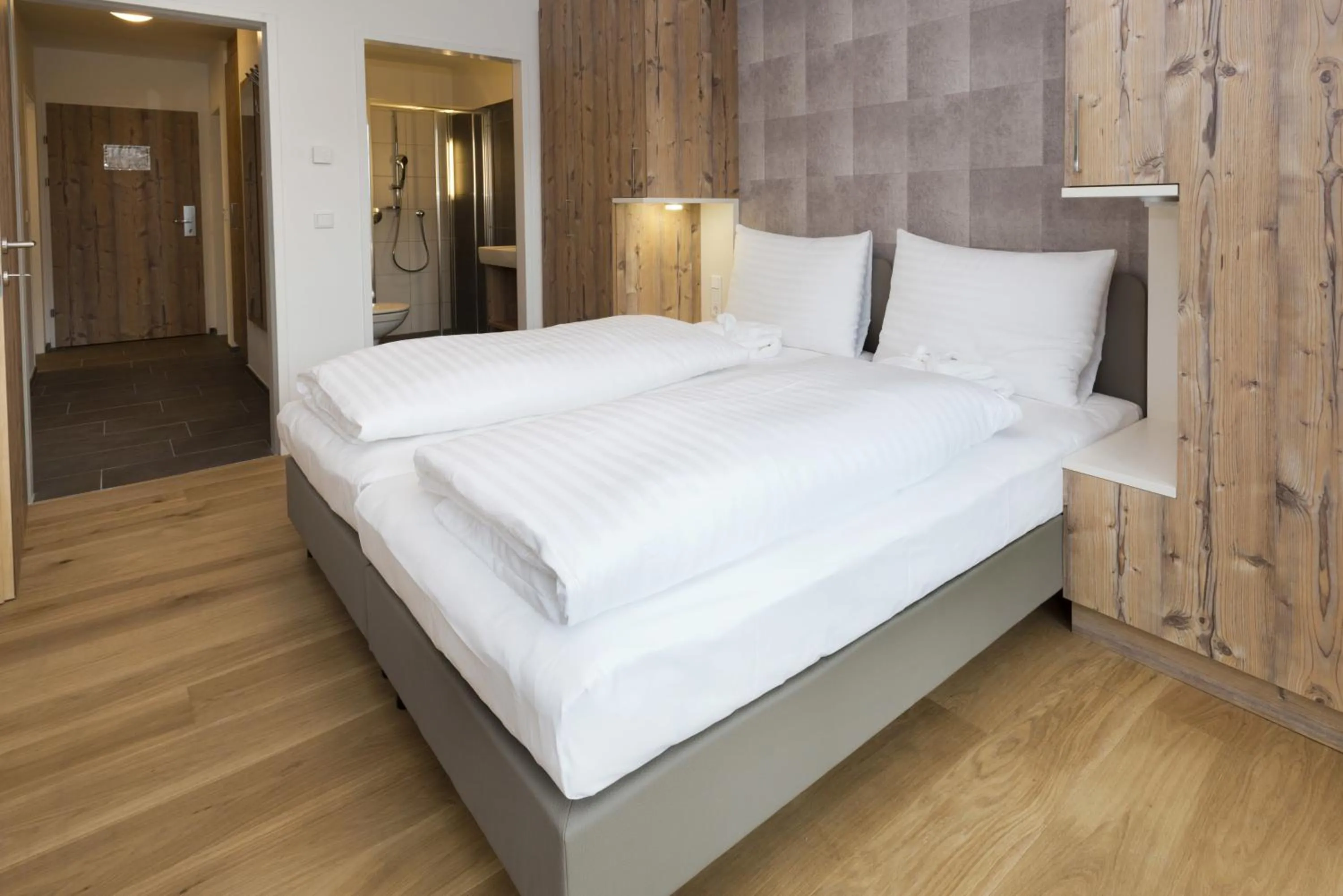 Bed in Ski & Golf Suites Zell am See by Alpin Rentals