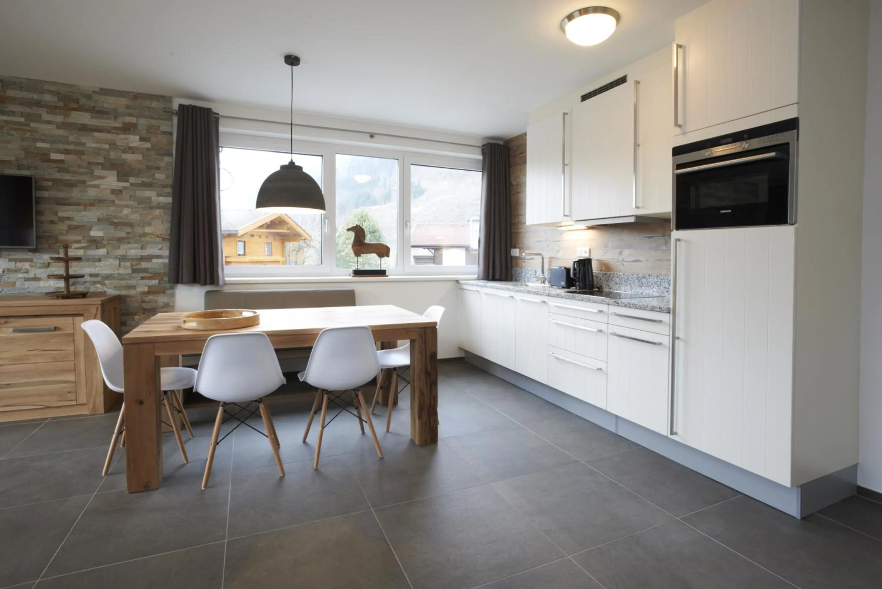 Kitchen or kitchenette in Ski & Golf Suites Zell am See by Alpin Rentals