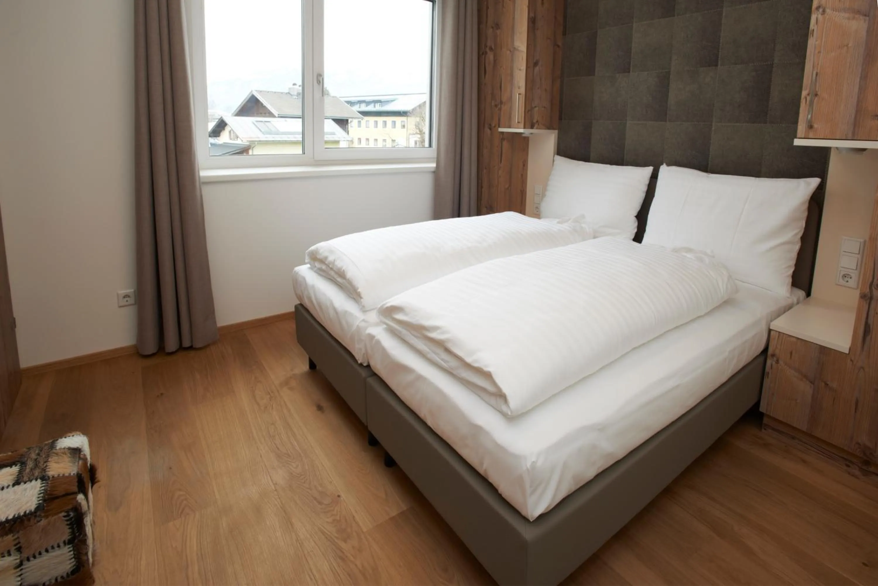 Bed in Ski & Golf Suites Zell am See by Alpin Rentals