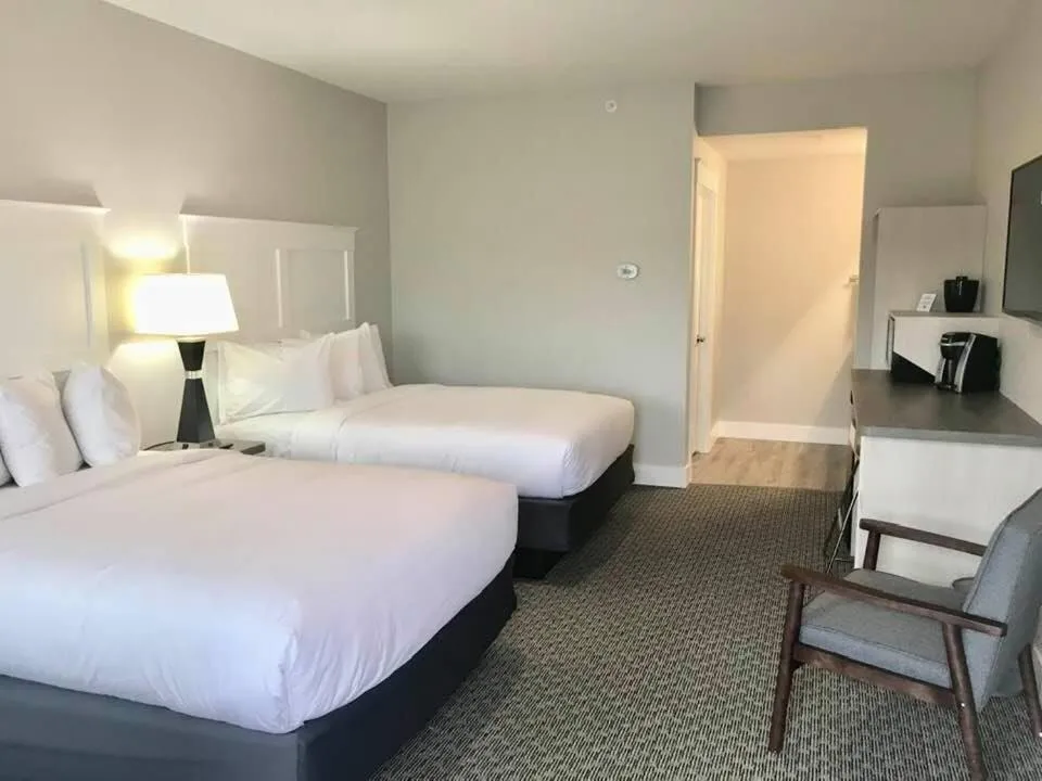 Bed in Empire Lakeshore Inn