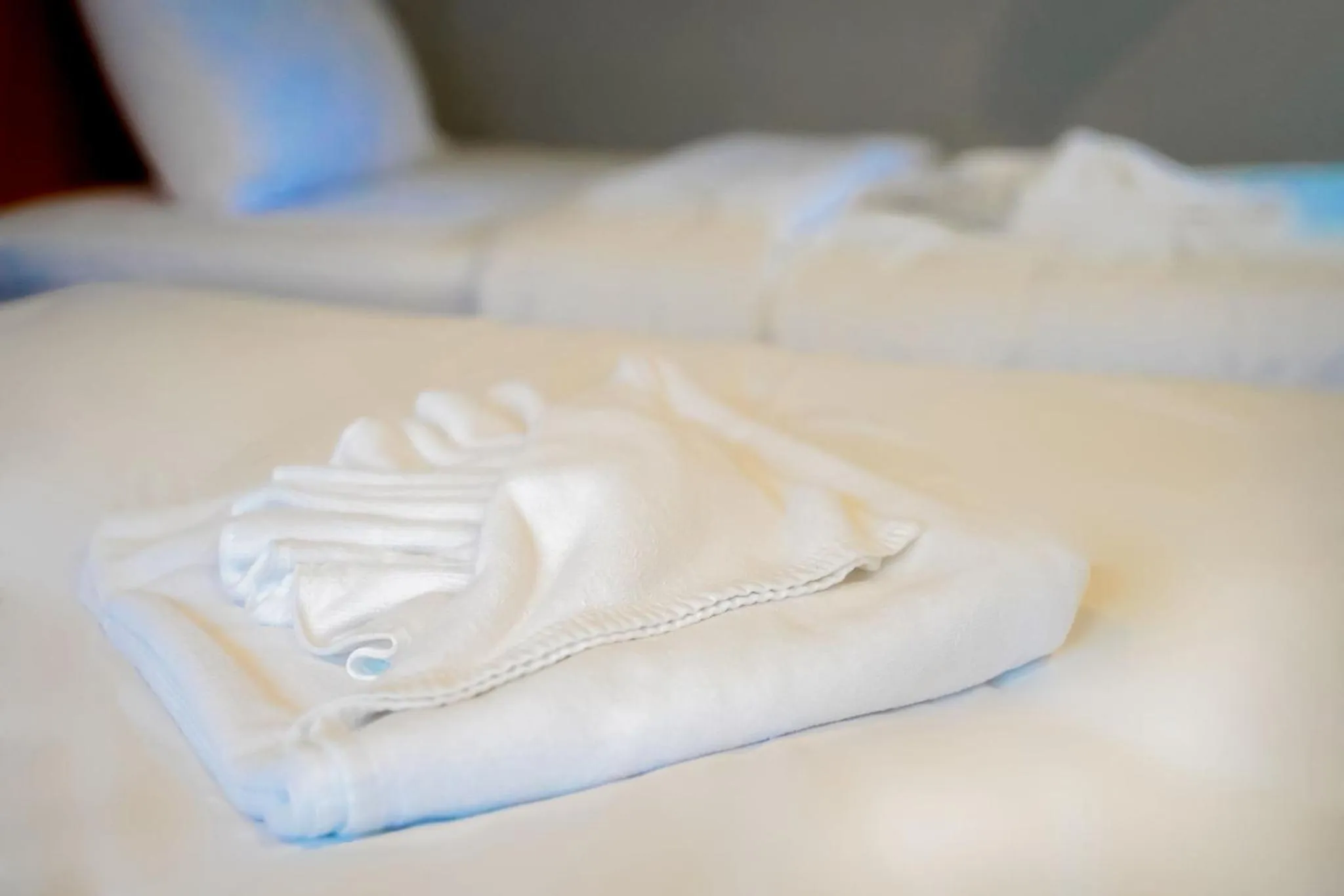 towels, Bed in Luna Hut Resort