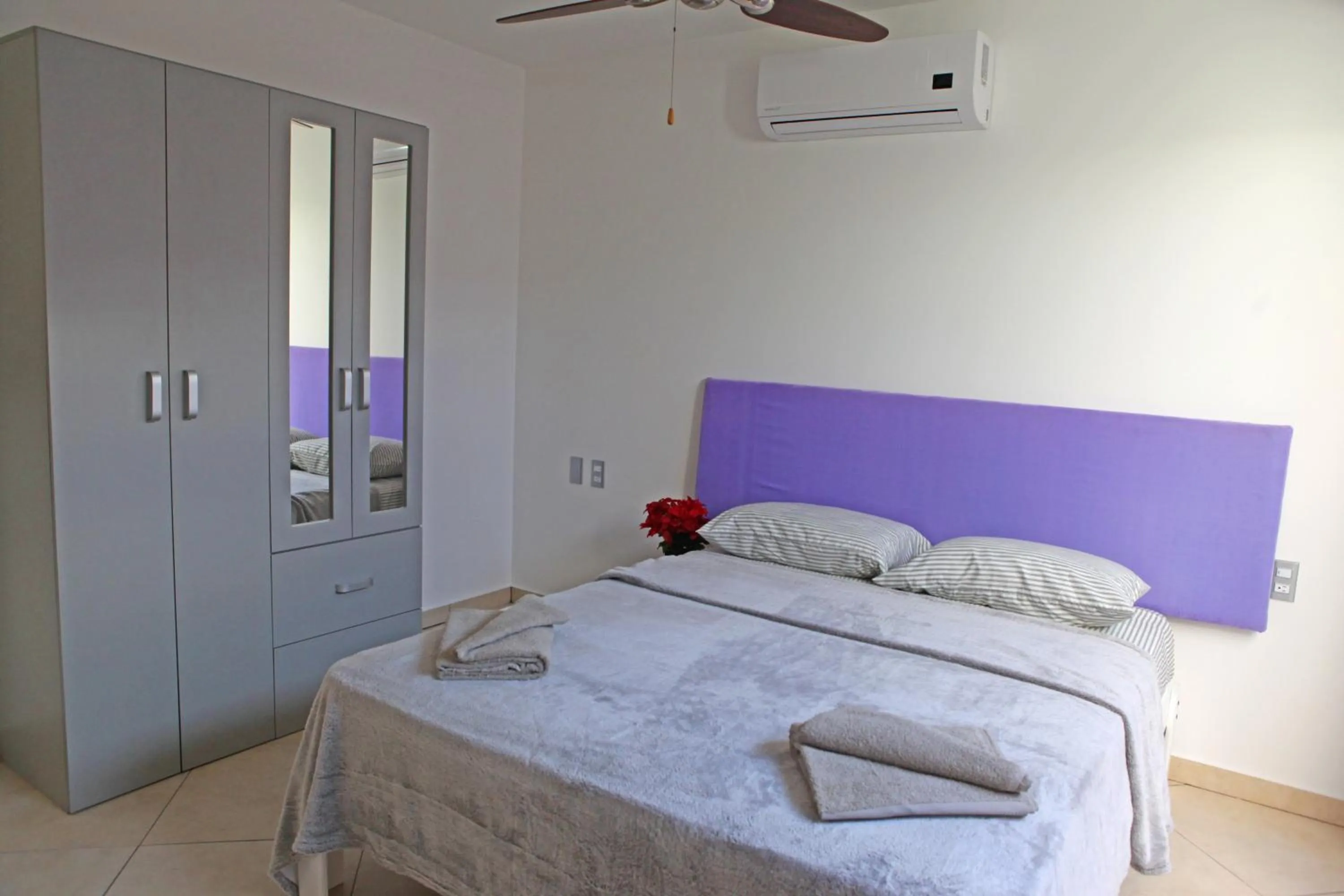 Decorative detail, Bed in Iris Studios & Apartments