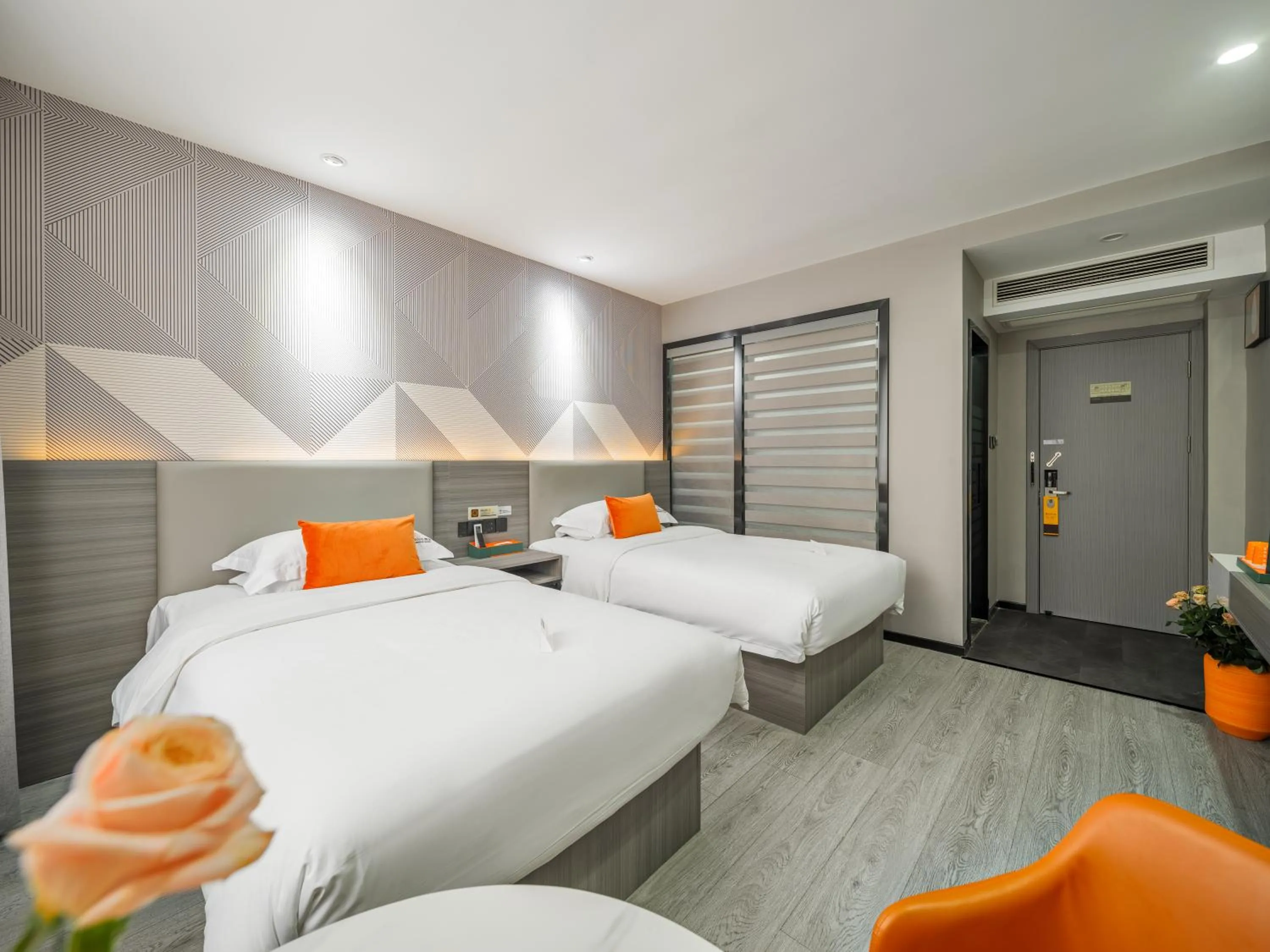 Bed in Orient Rose International Hotel