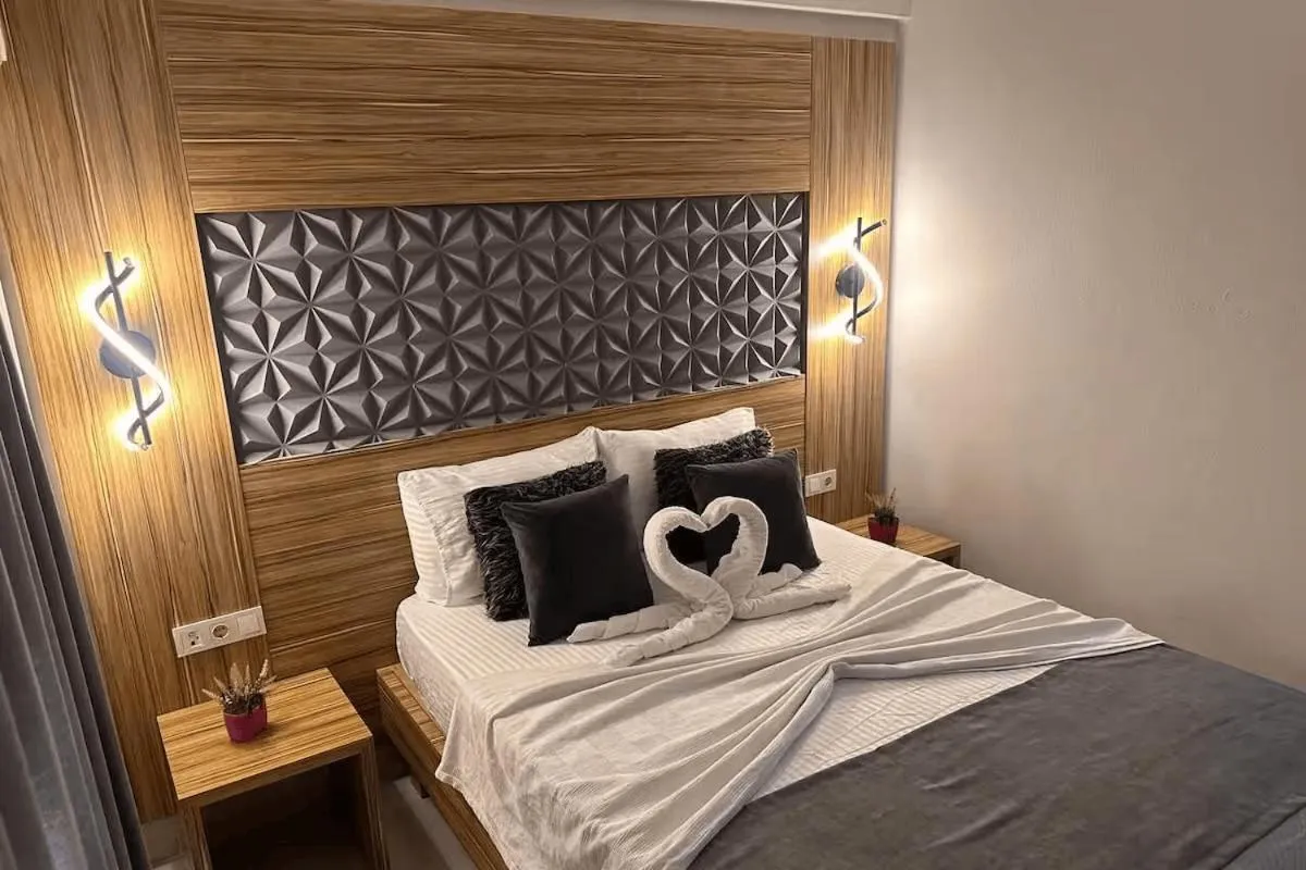 Bed in Royal Ezel Hotel