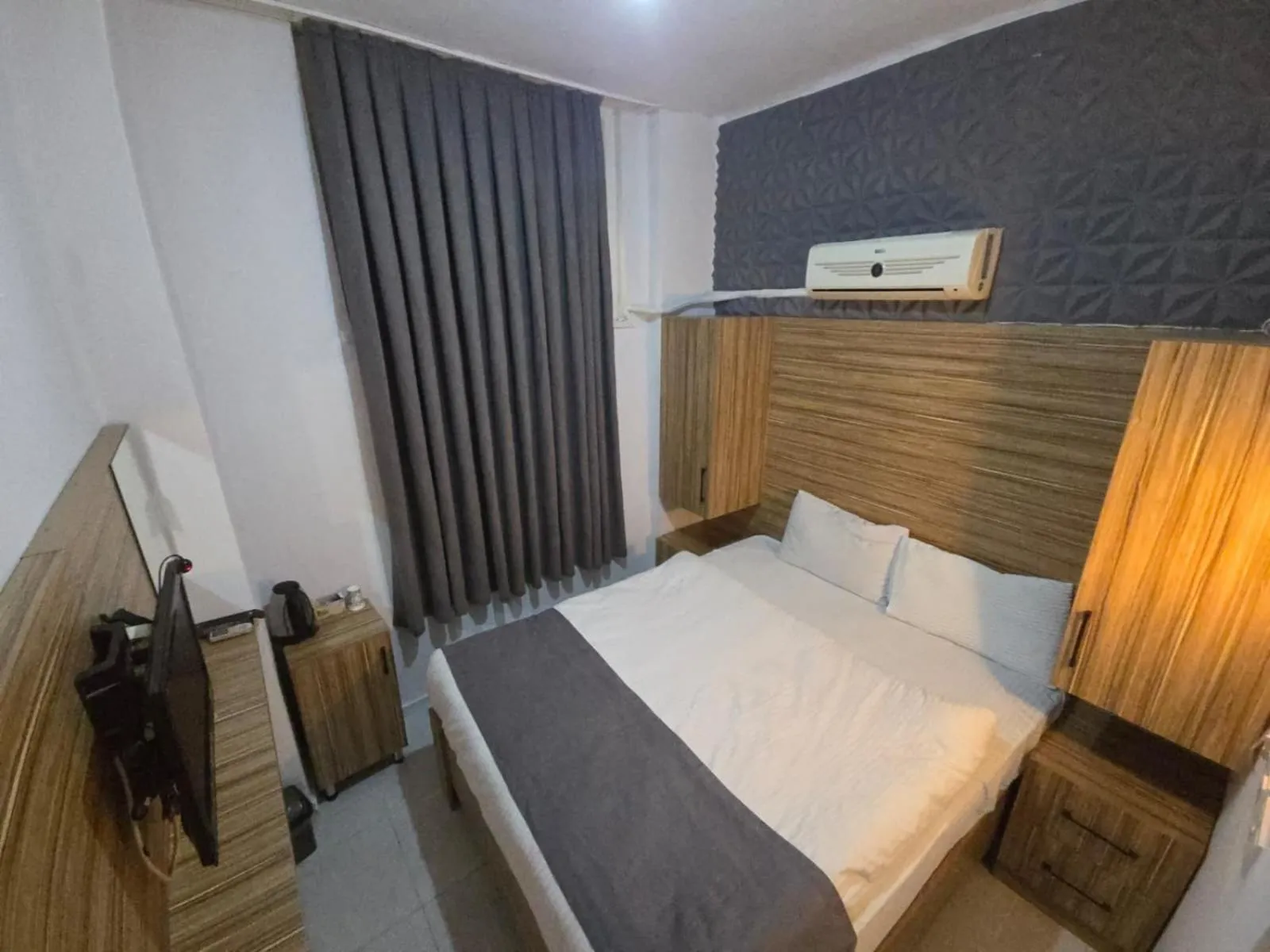 Bed in Royal Ezel Hotel