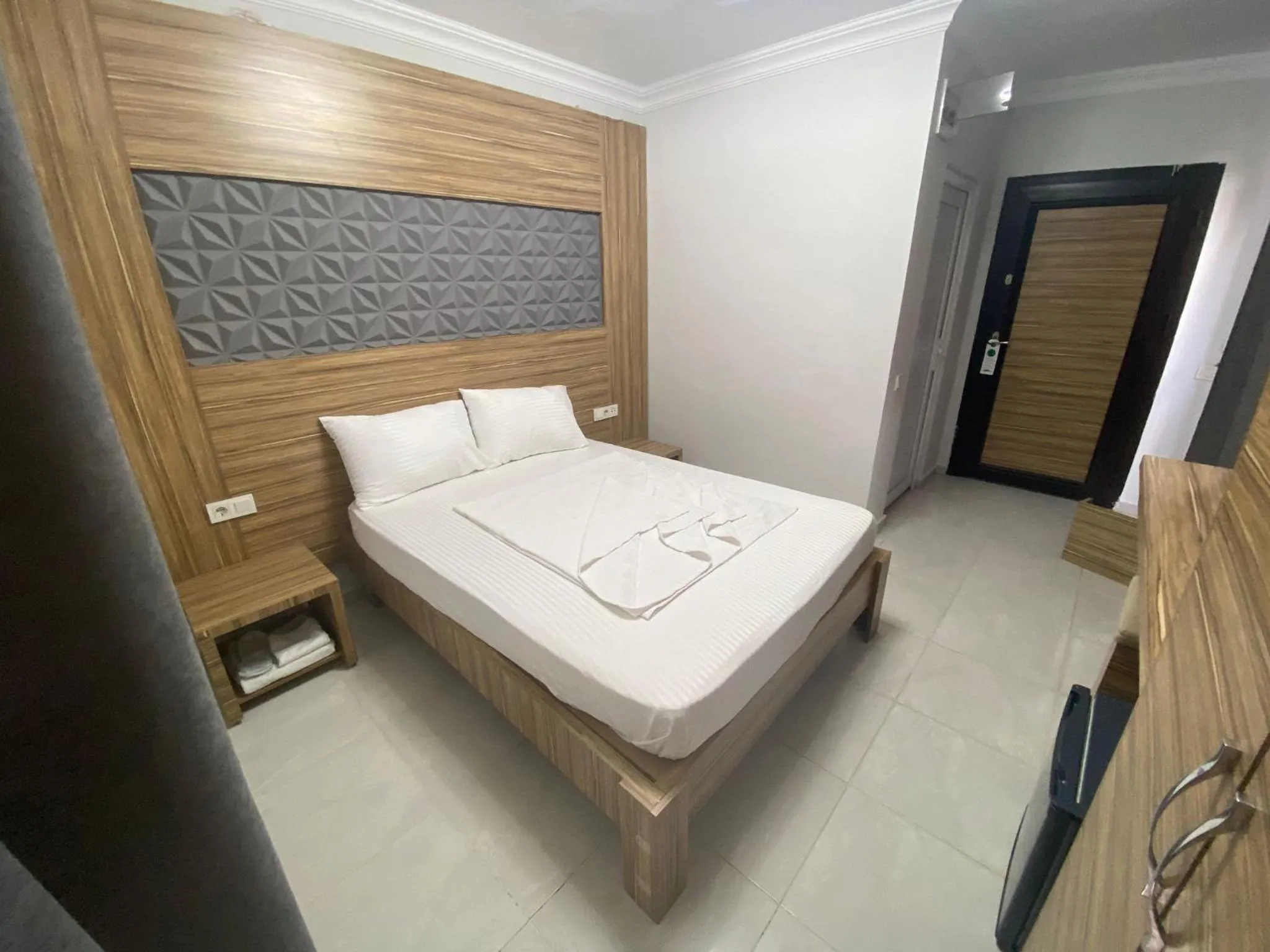 Bed in Royal Ezel Hotel