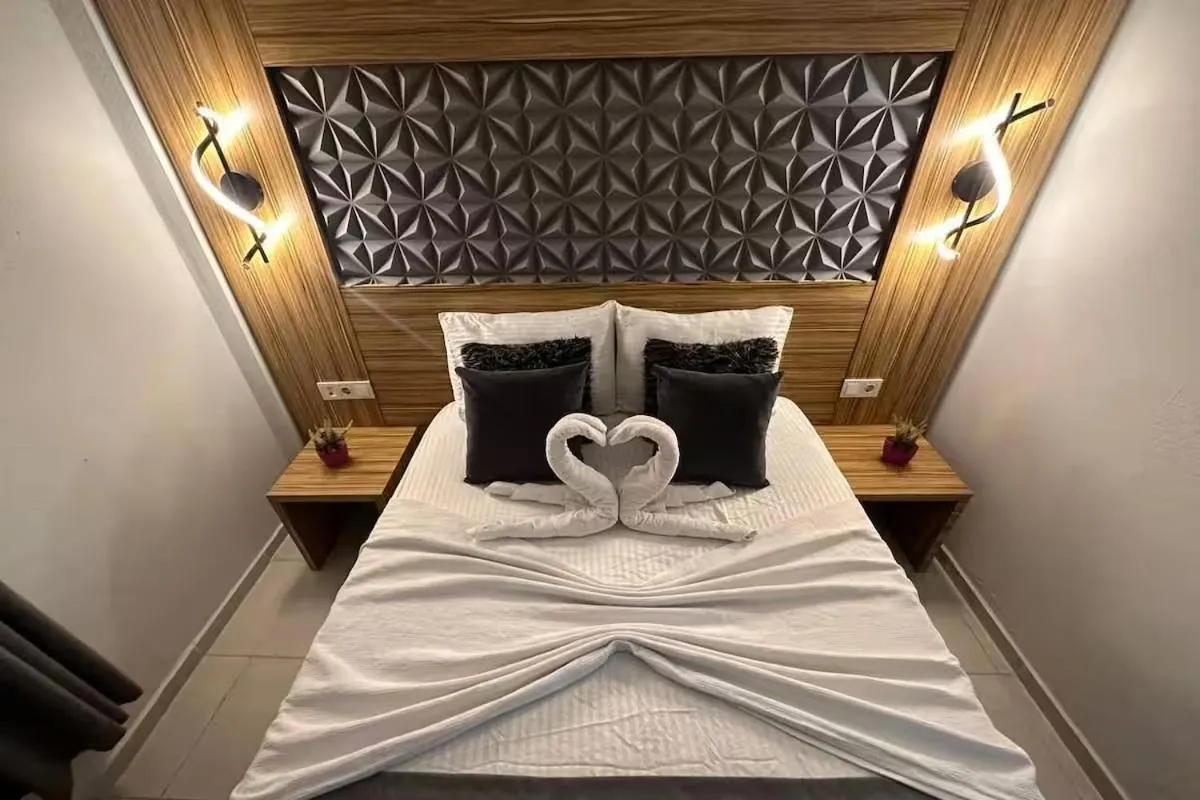 Bed in Royal Ezel Hotel