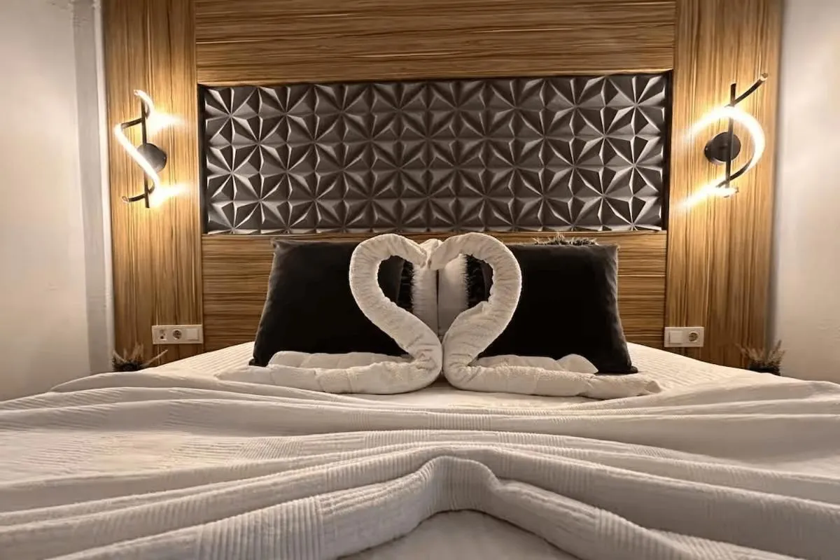 Bed in Royal Ezel Hotel