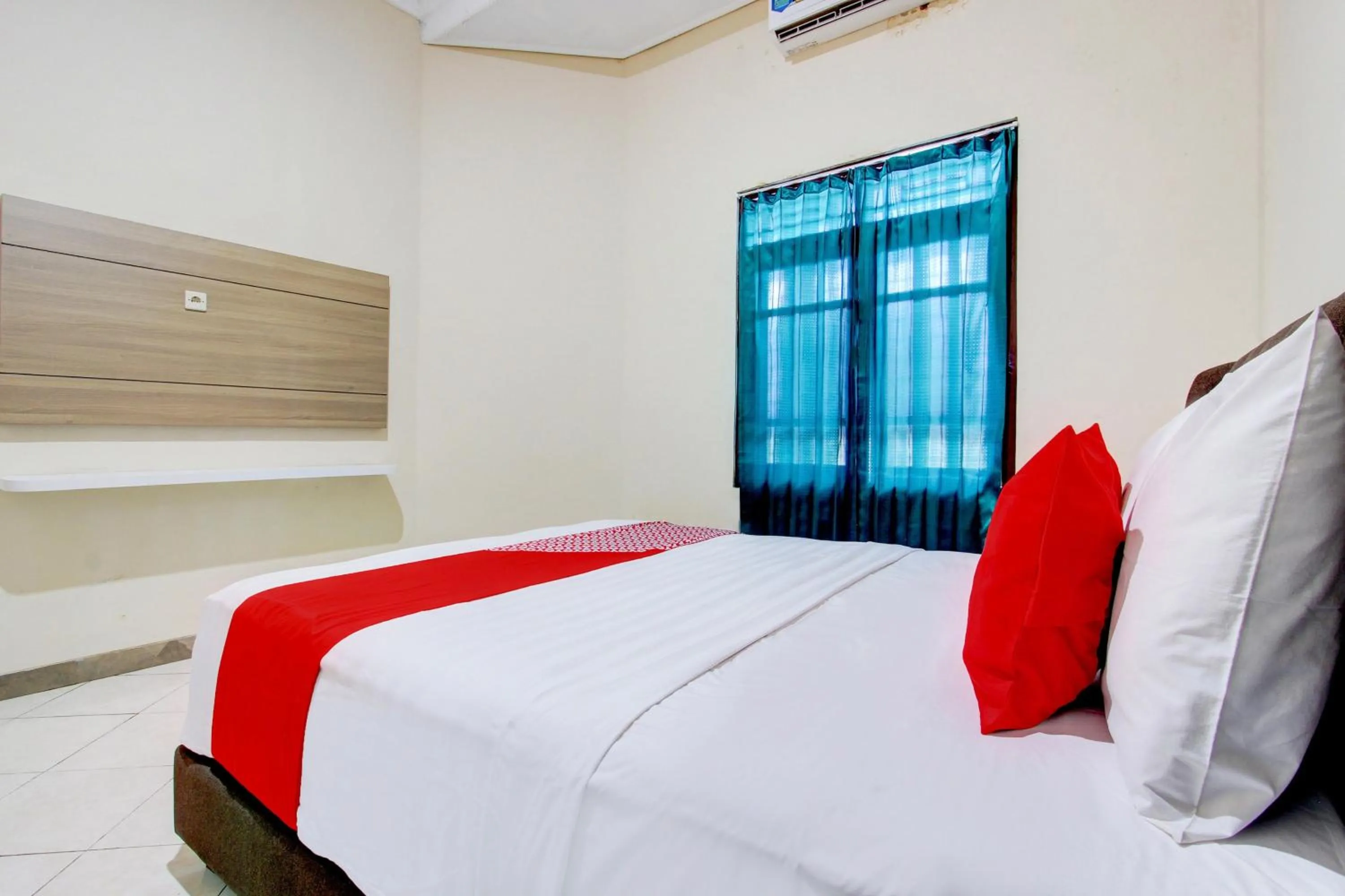 Bedroom, Bed in Hotel O Delia Inn Syariah