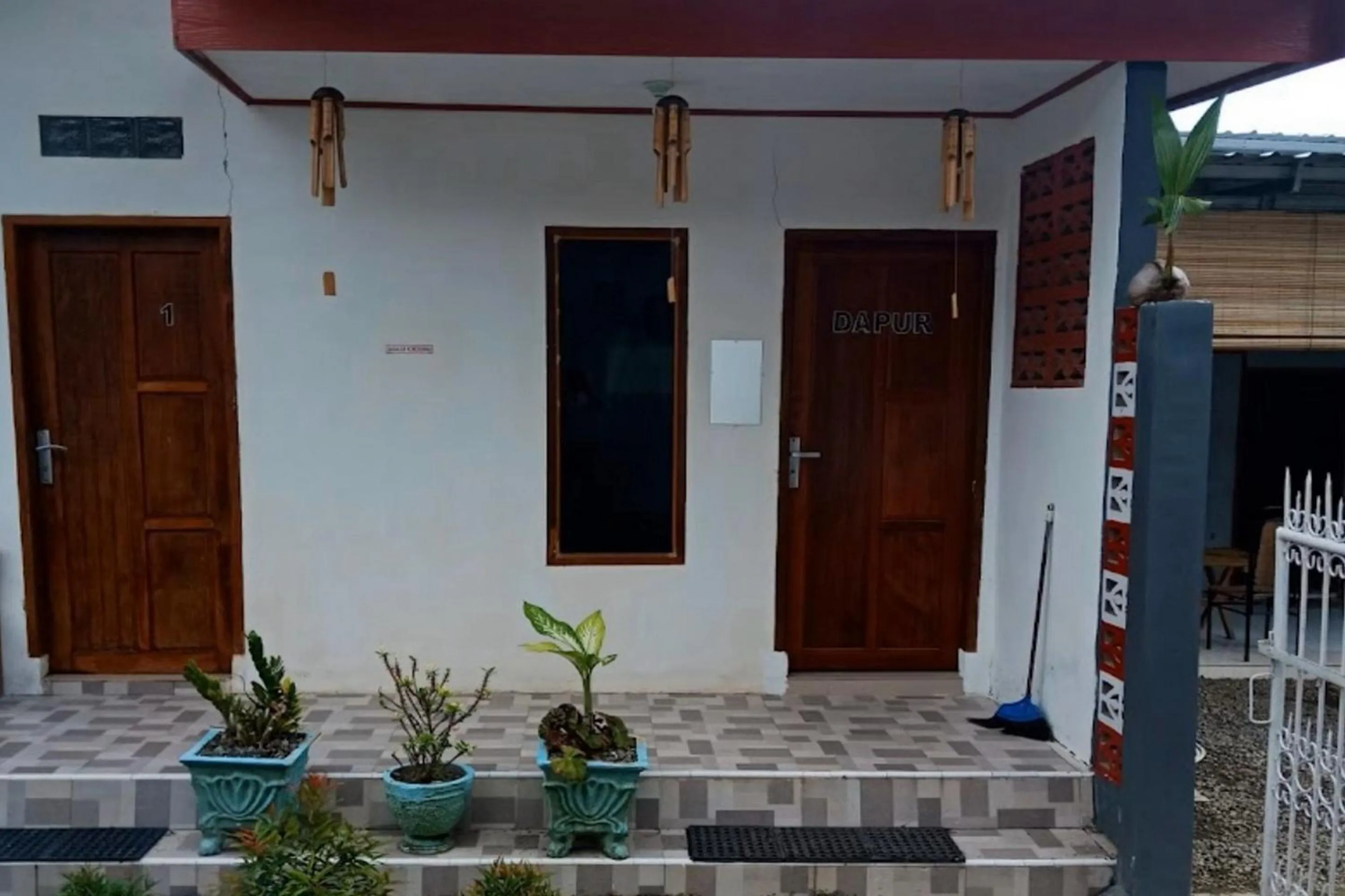 Facade/entrance in Hotel O Kost Reski 1 Near Pasar Rakyat Limbung