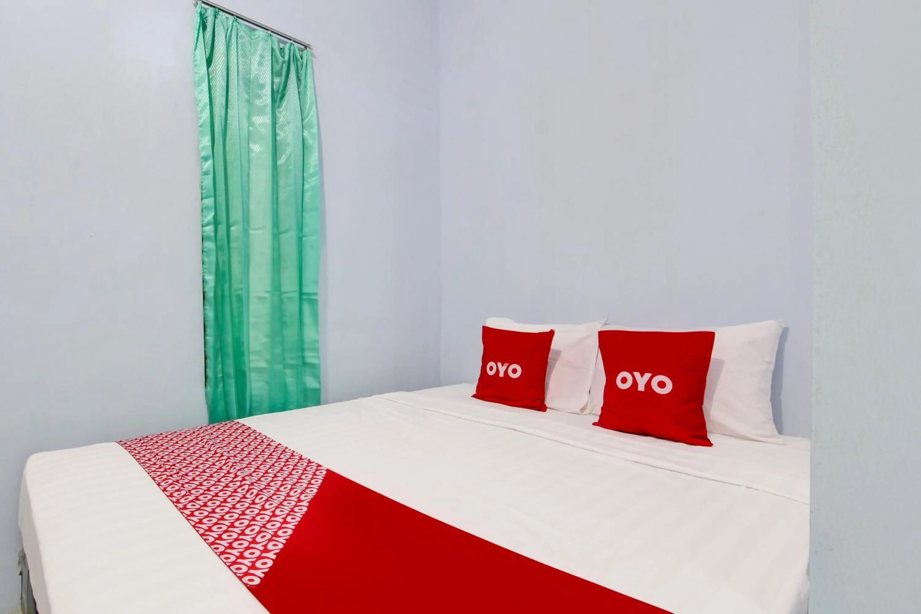 Bedroom in Hotel O Minso Inn Sepanjang