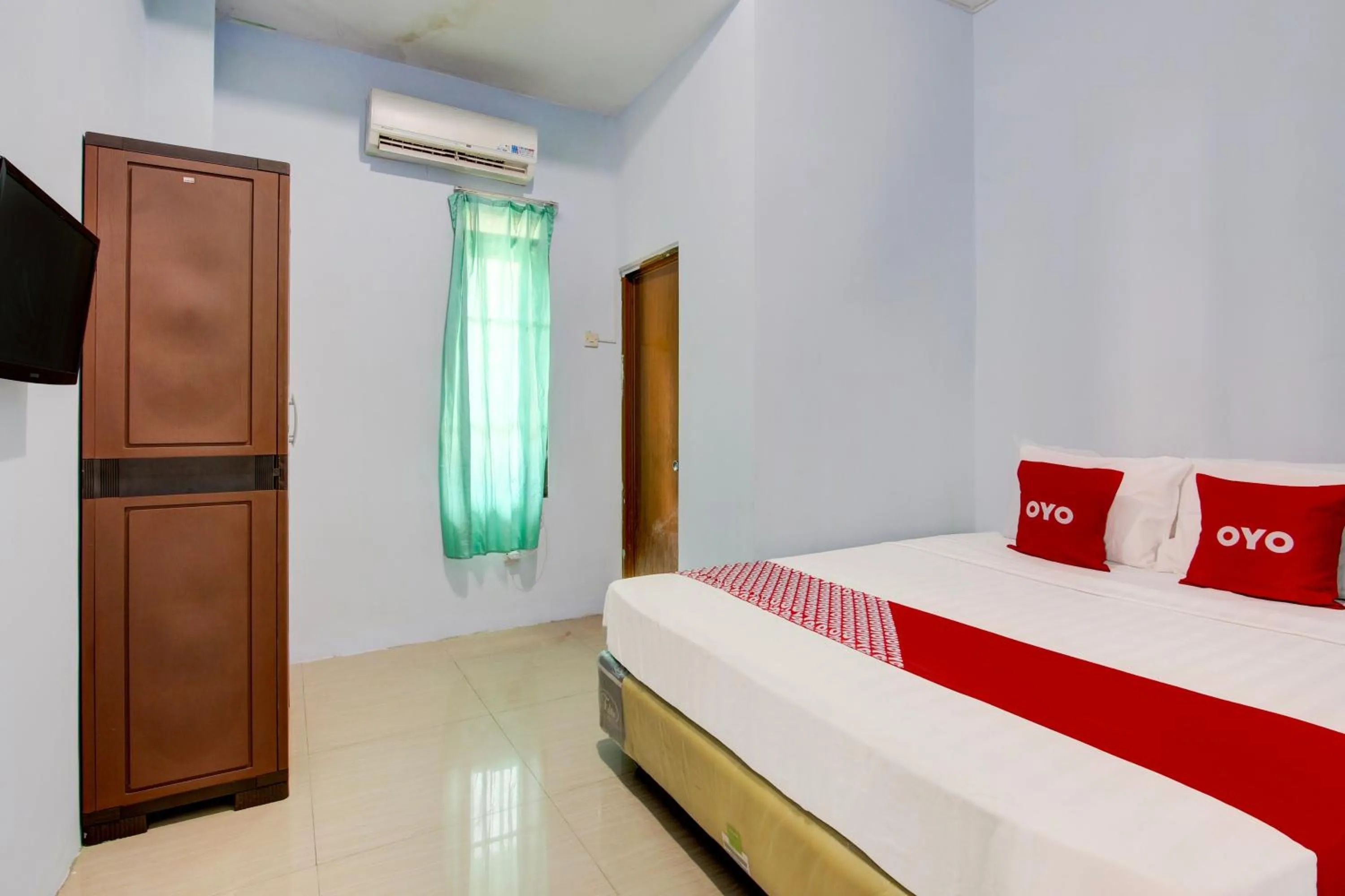 Bedroom in Hotel O Minso Inn Sepanjang