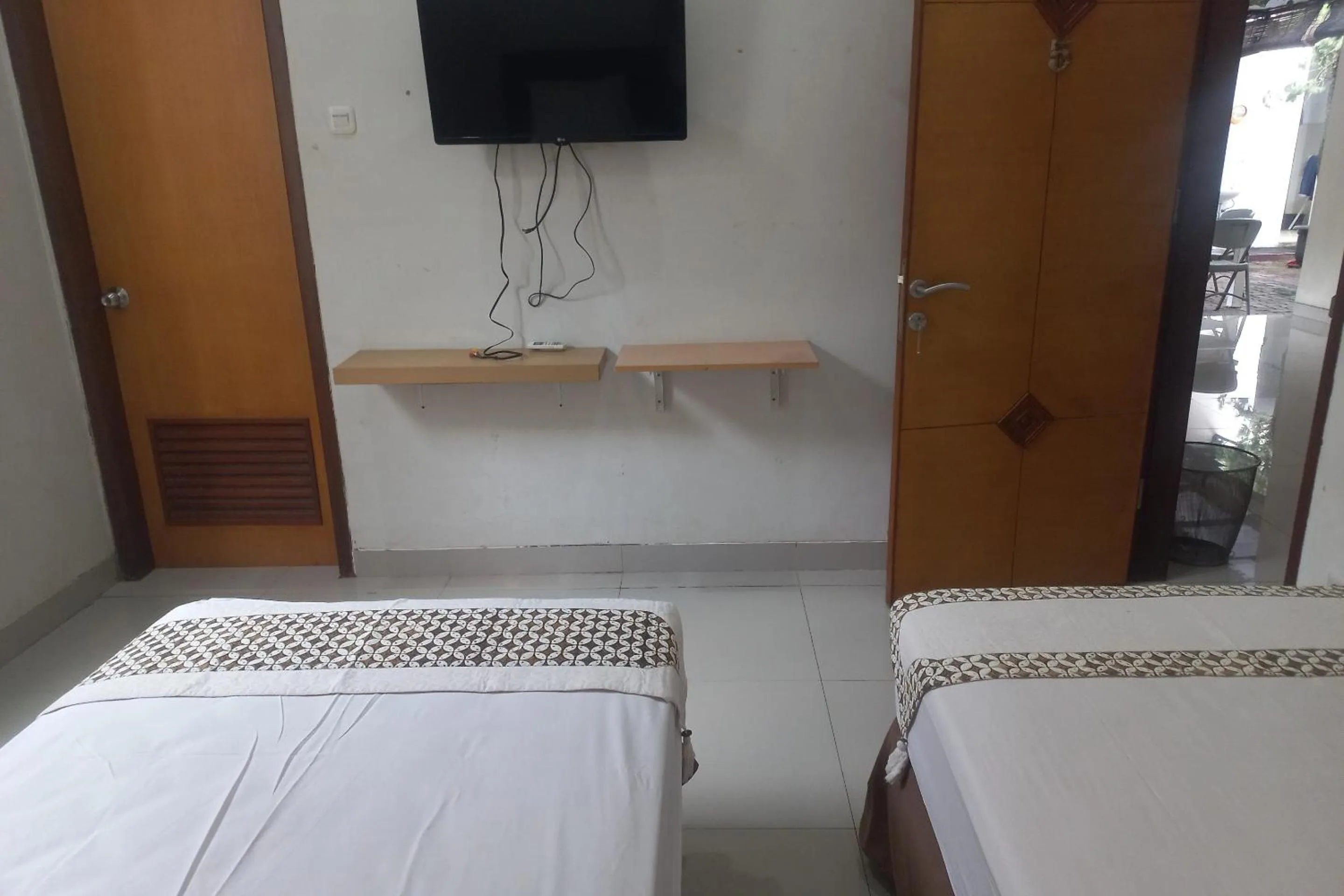 Bedroom, Bed in Capital O 93872 Natura Guest House Syariah Near alun alun kota purwokerto