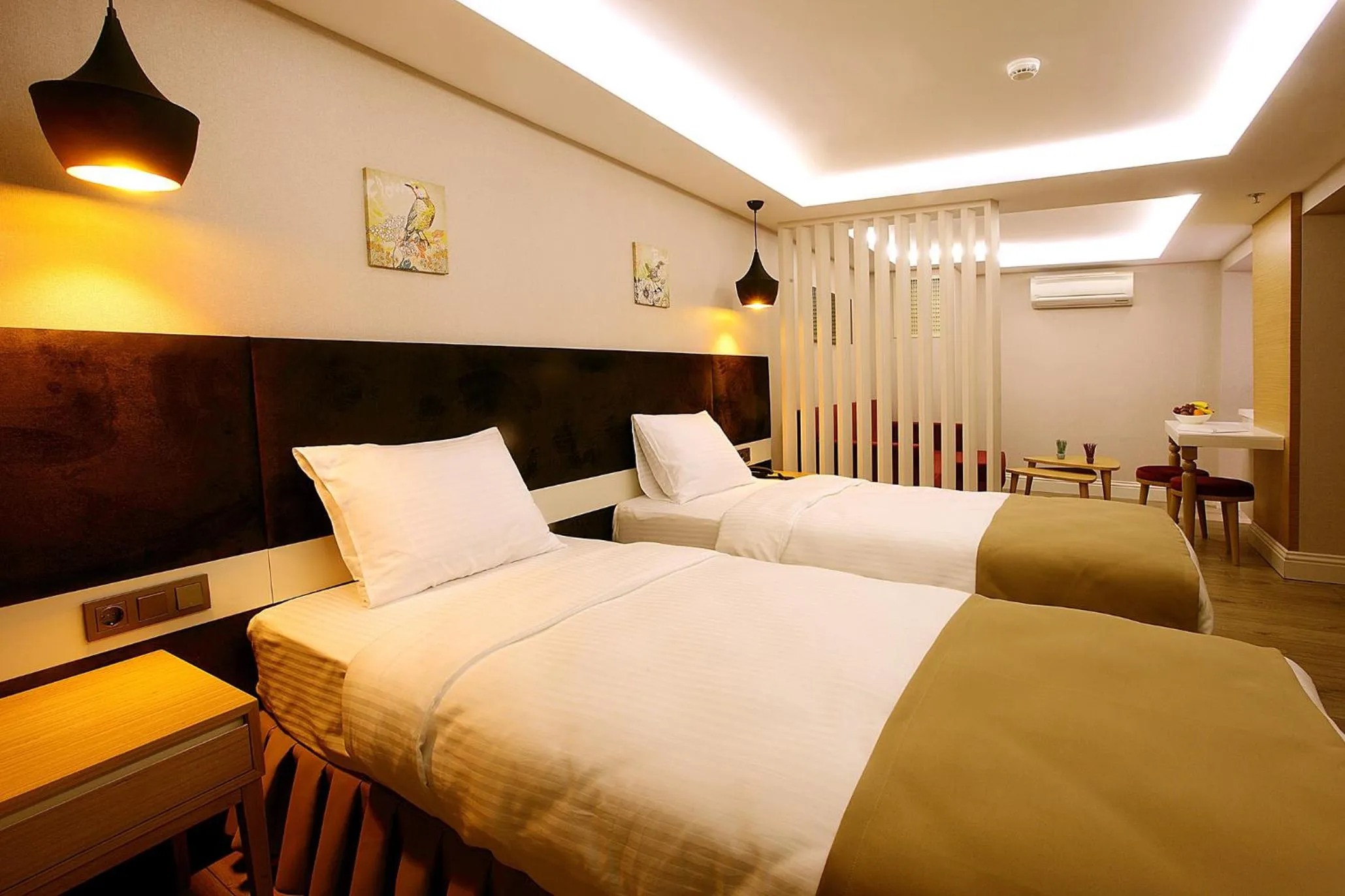 Seating area, Bed in Carina Park Suites Nisantasi