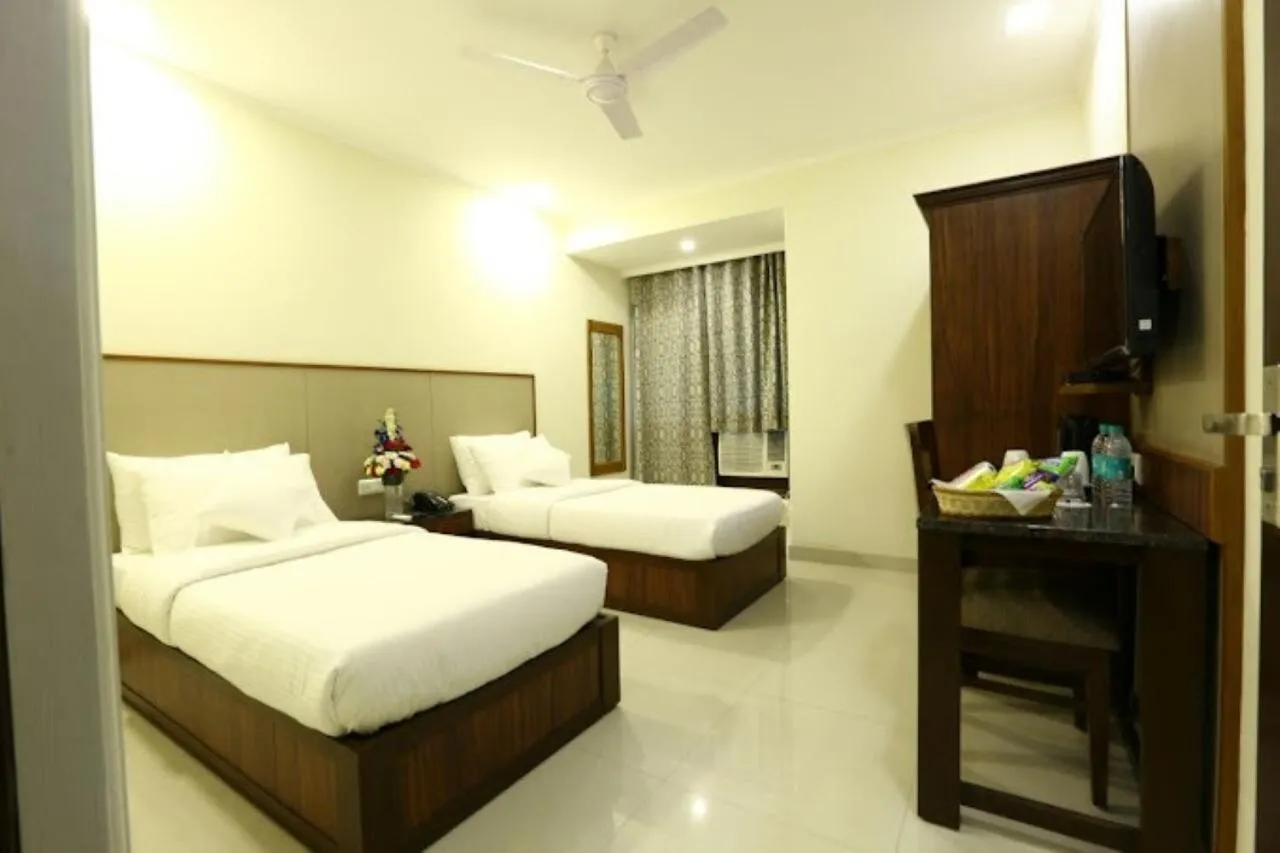Bed in Hotel Rainbow Ghaziabad