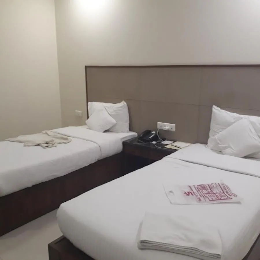 Photo of the whole room, Bed in Hotel Rainbow Ghaziabad