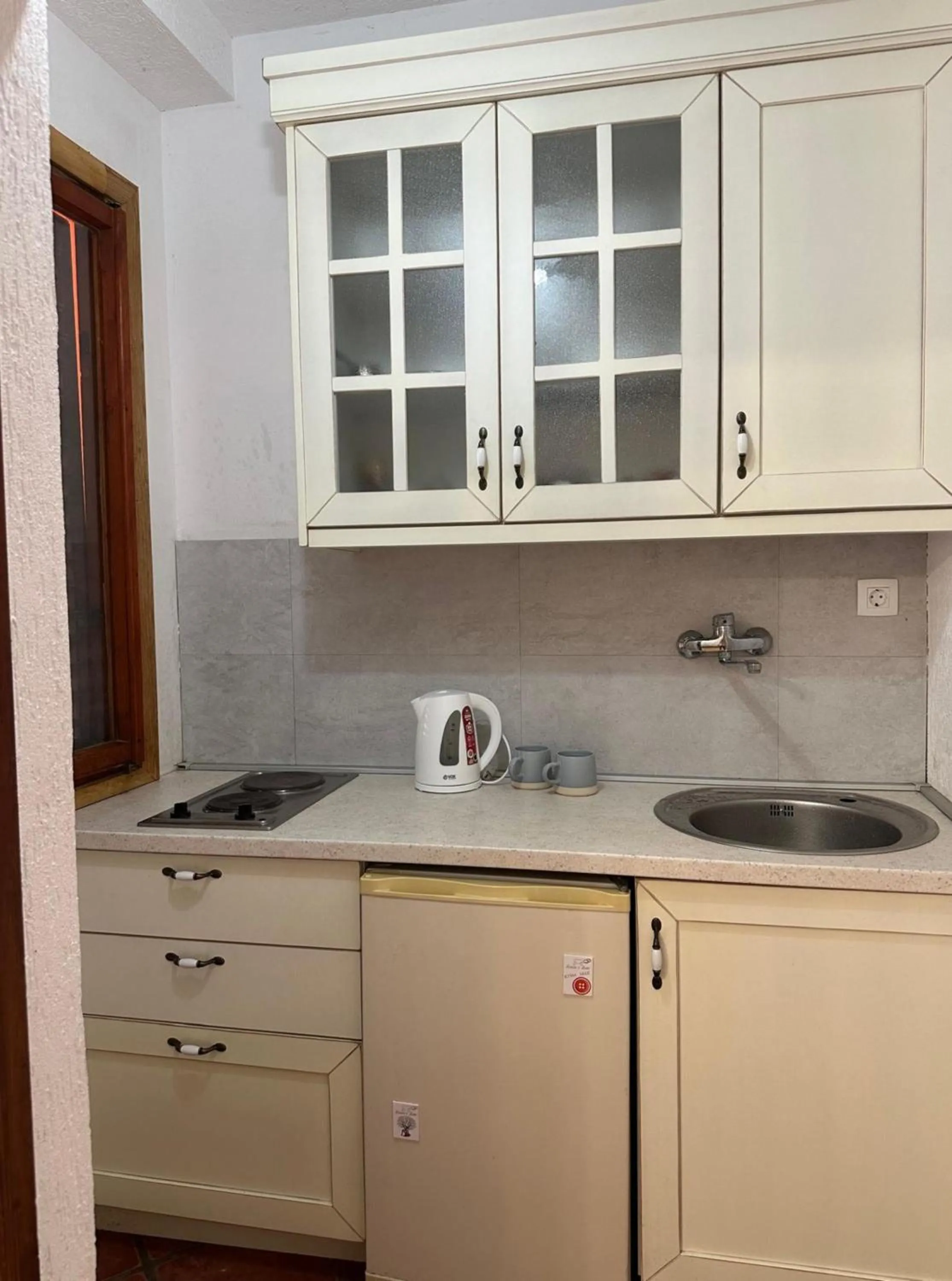 Kitchen or kitchenette in Themis Apartment