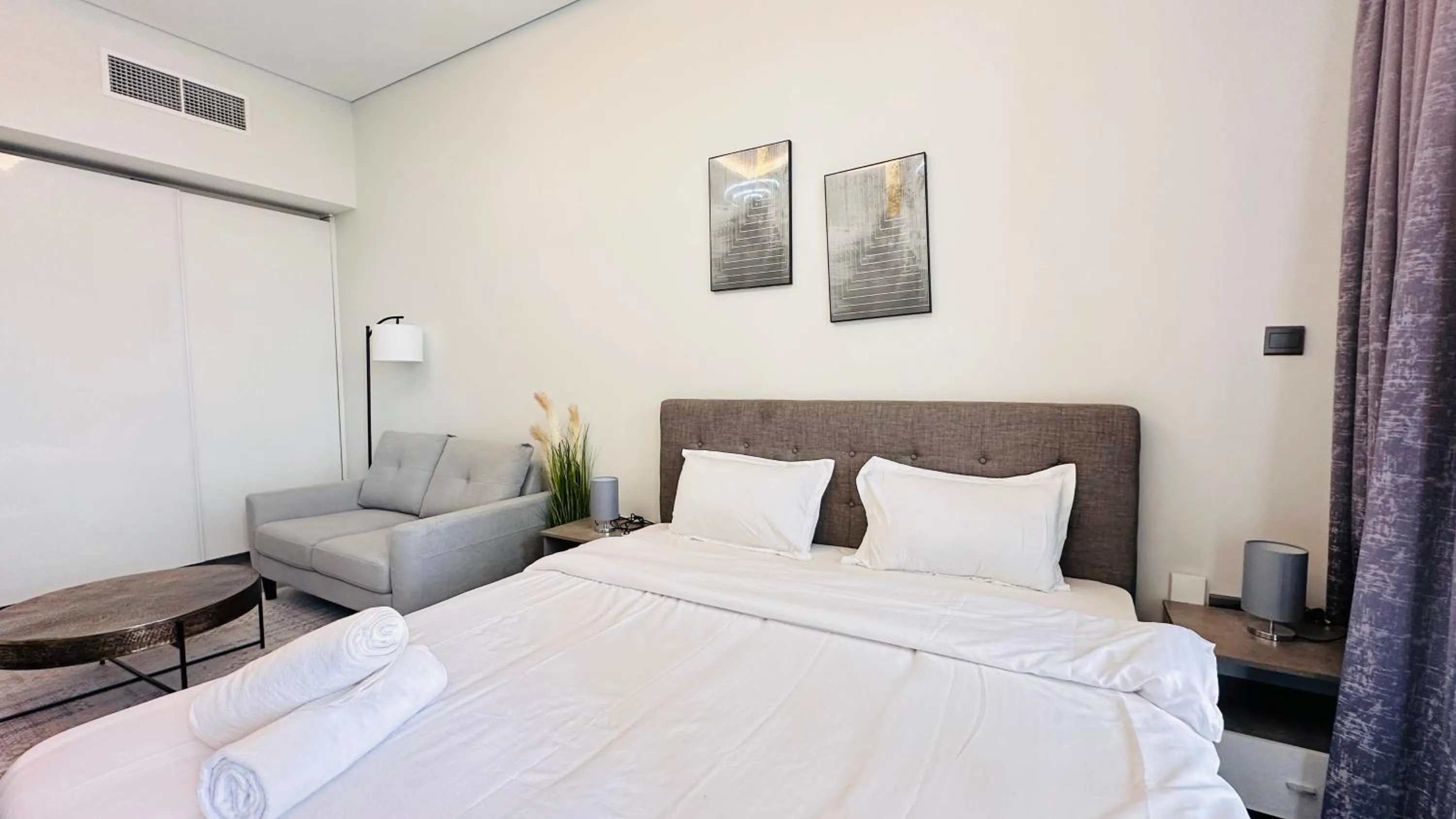Bedroom, Bed in Spacious Studio Apartment Burj View with Balcony Free Parking by Belvilla