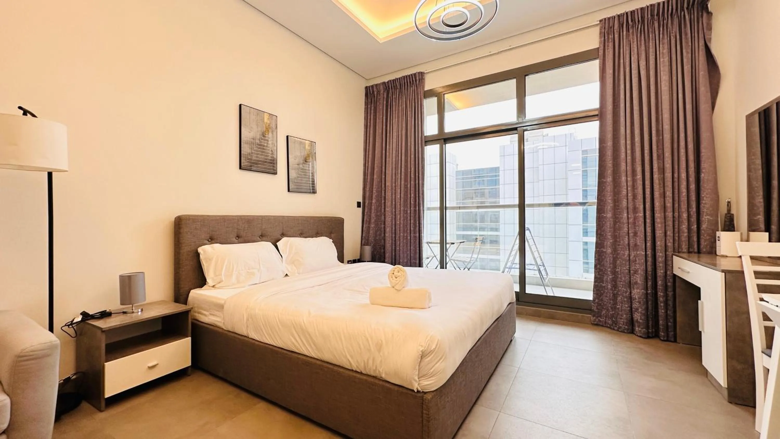 Bedroom, Bed in Spacious Studio Apartment Burj View with Balcony Free Parking by Belvilla