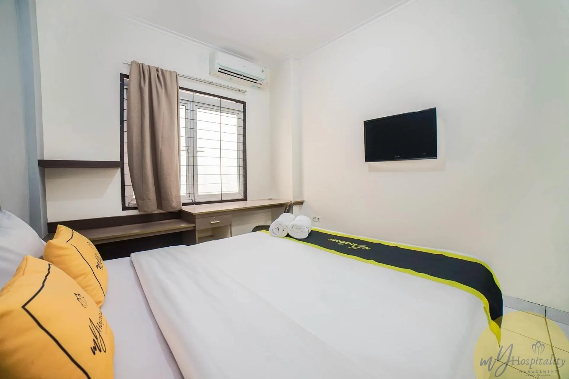 Bed in Fortuna Hotel & Residence by My Hospitality