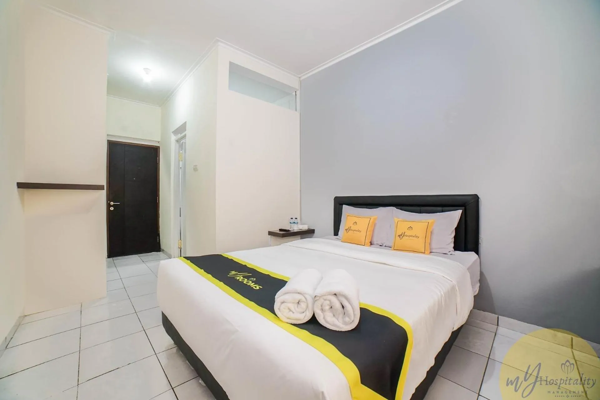 Bed in Fortuna Hotel & Residence by My Hospitality