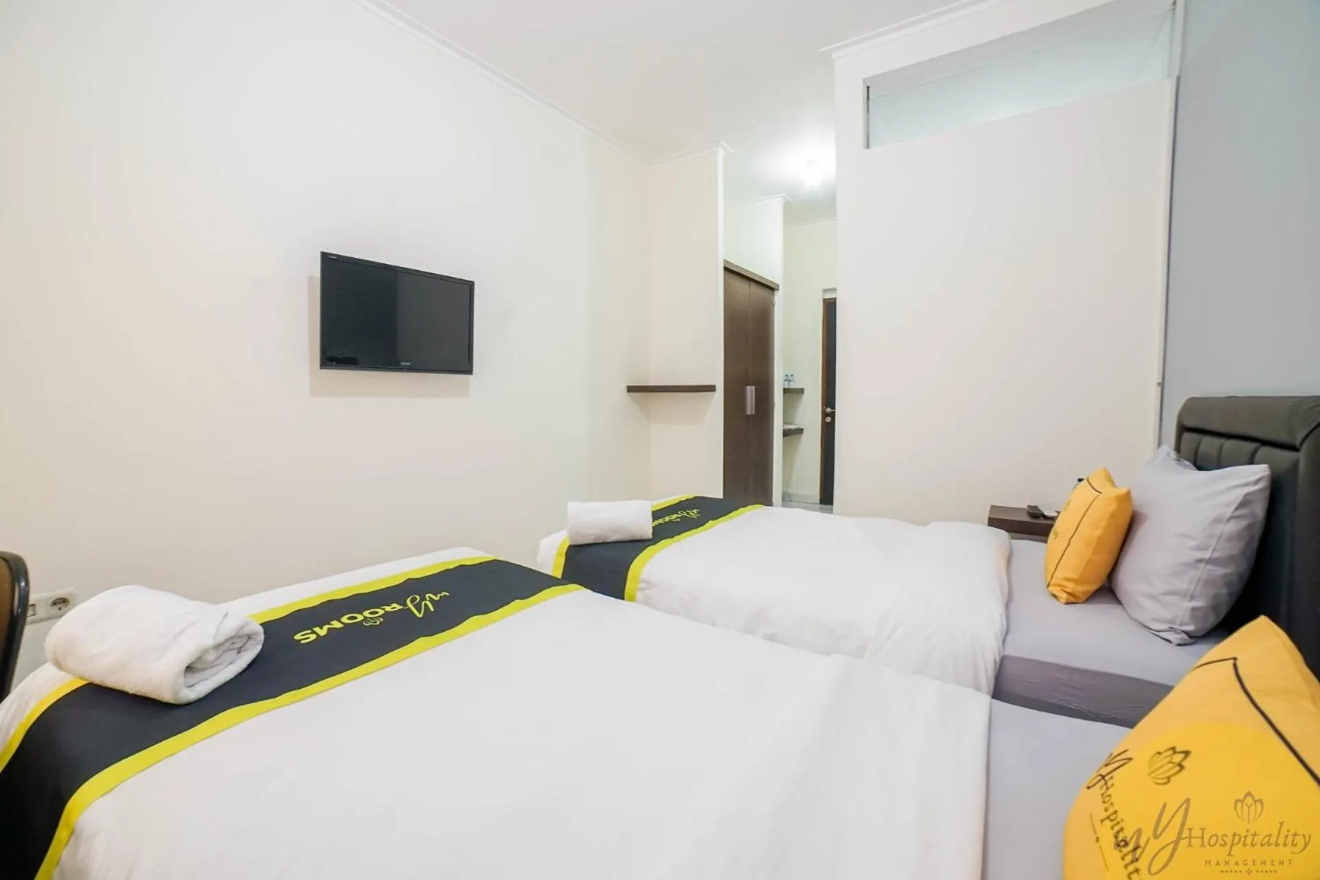 Bed in Fortuna Hotel & Residence by My Hospitality