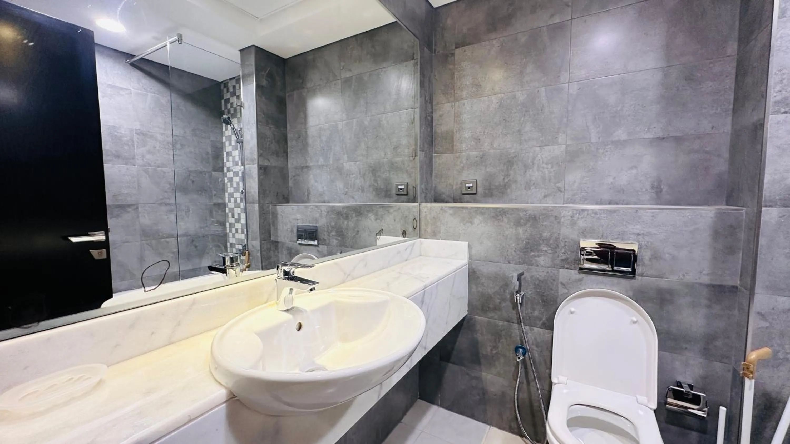 Bathroom in Spacious Studio Apartment Palm View with Big Balcony Free Parking by Belvilla