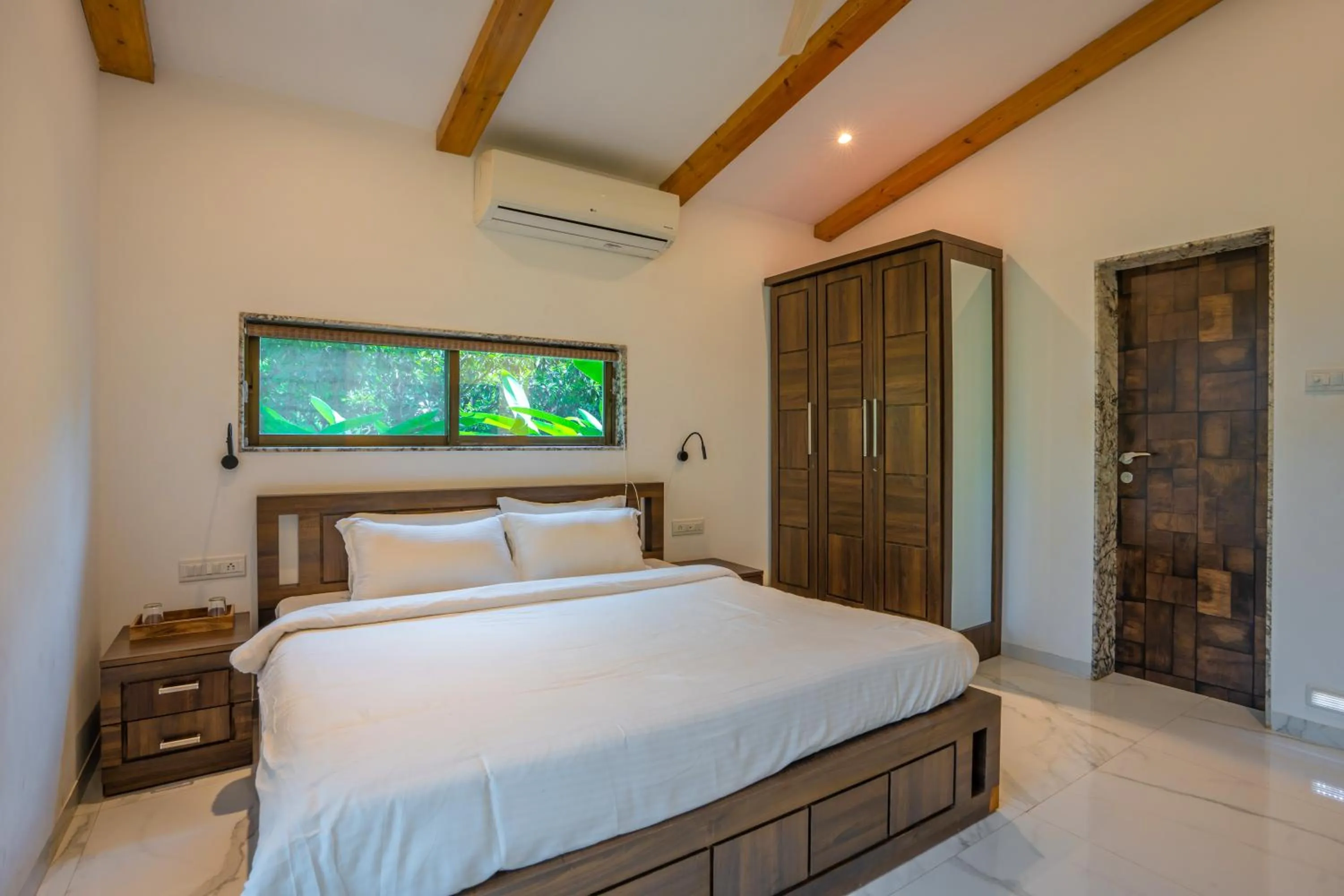 Bed in Energise Soul Retreat By ELIVAAS, Trimbakeshwar Nashik