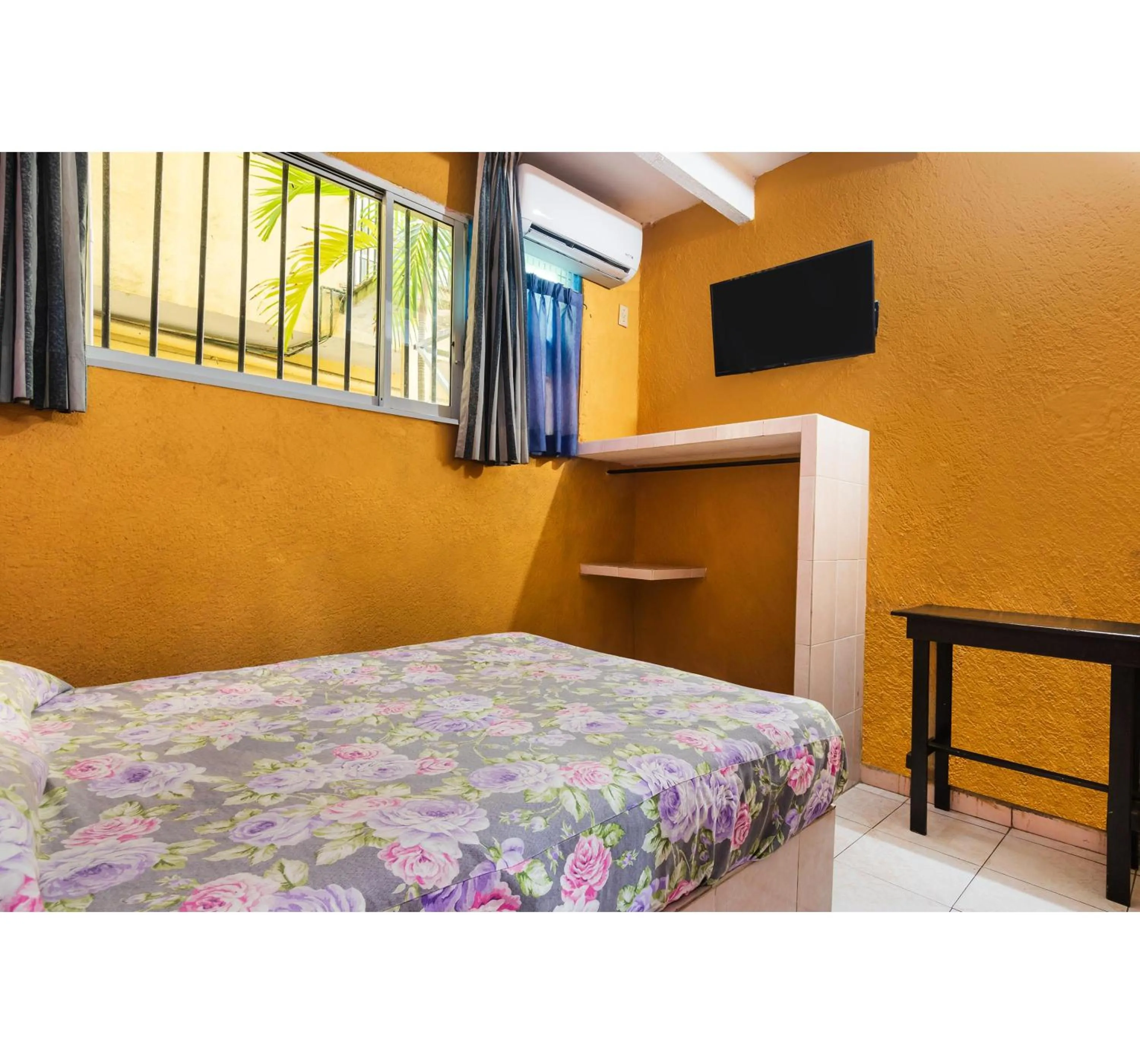 Bedroom in OYO Hotel San Martin