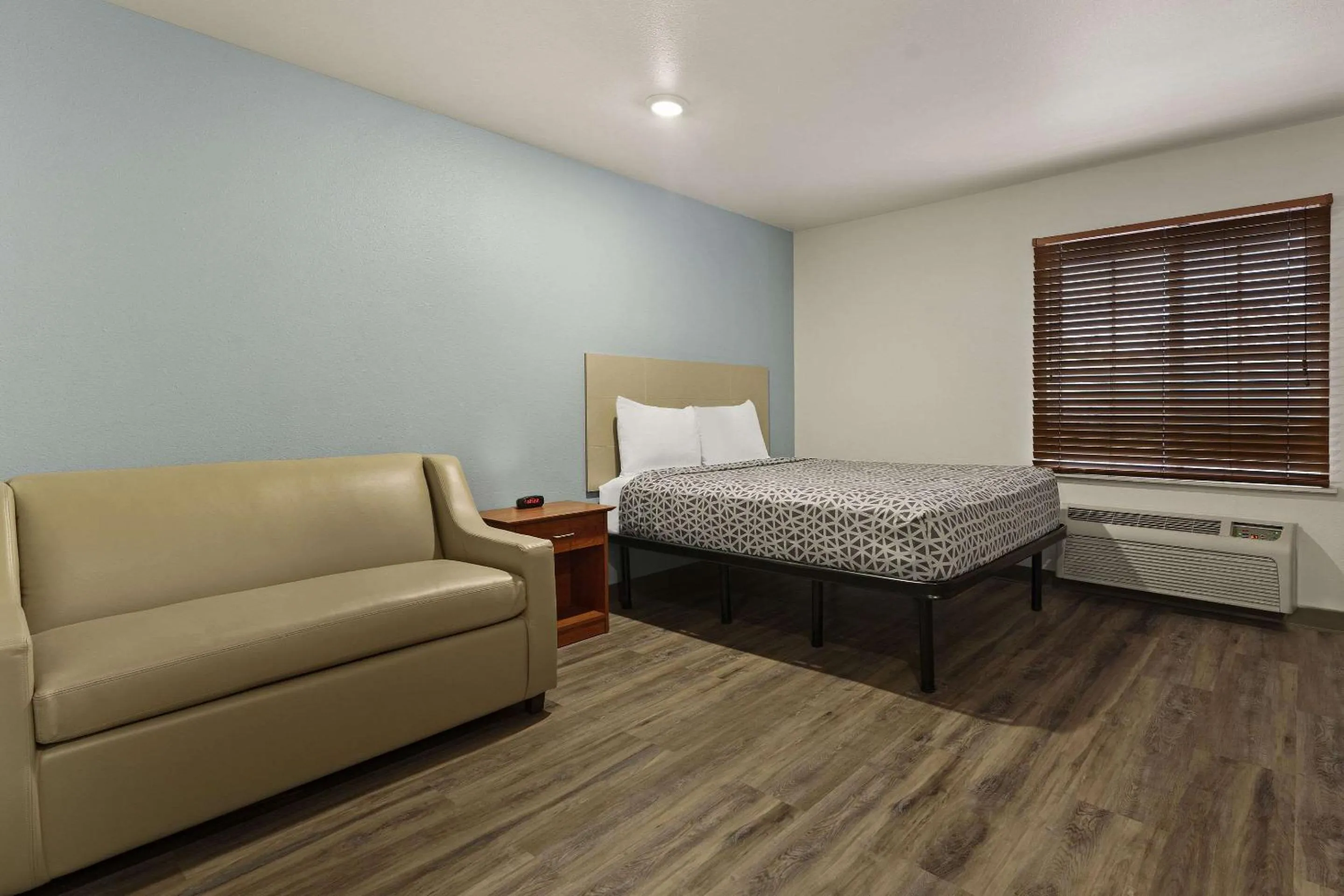 Bedroom in WoodSpring Suites Augusta Riverwatch