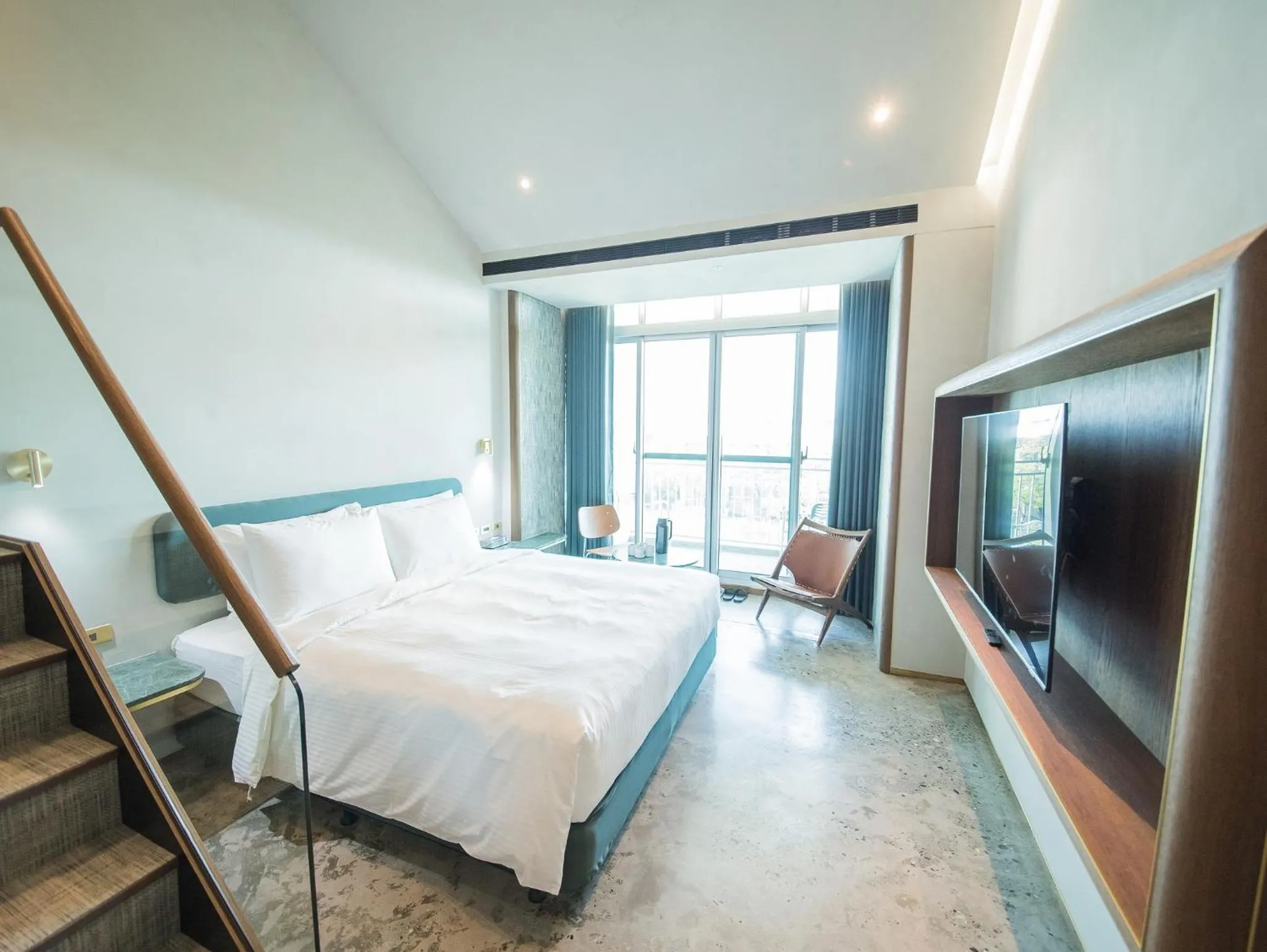 Photo of the whole room, Bed in PAPO'A Harbor Hotel